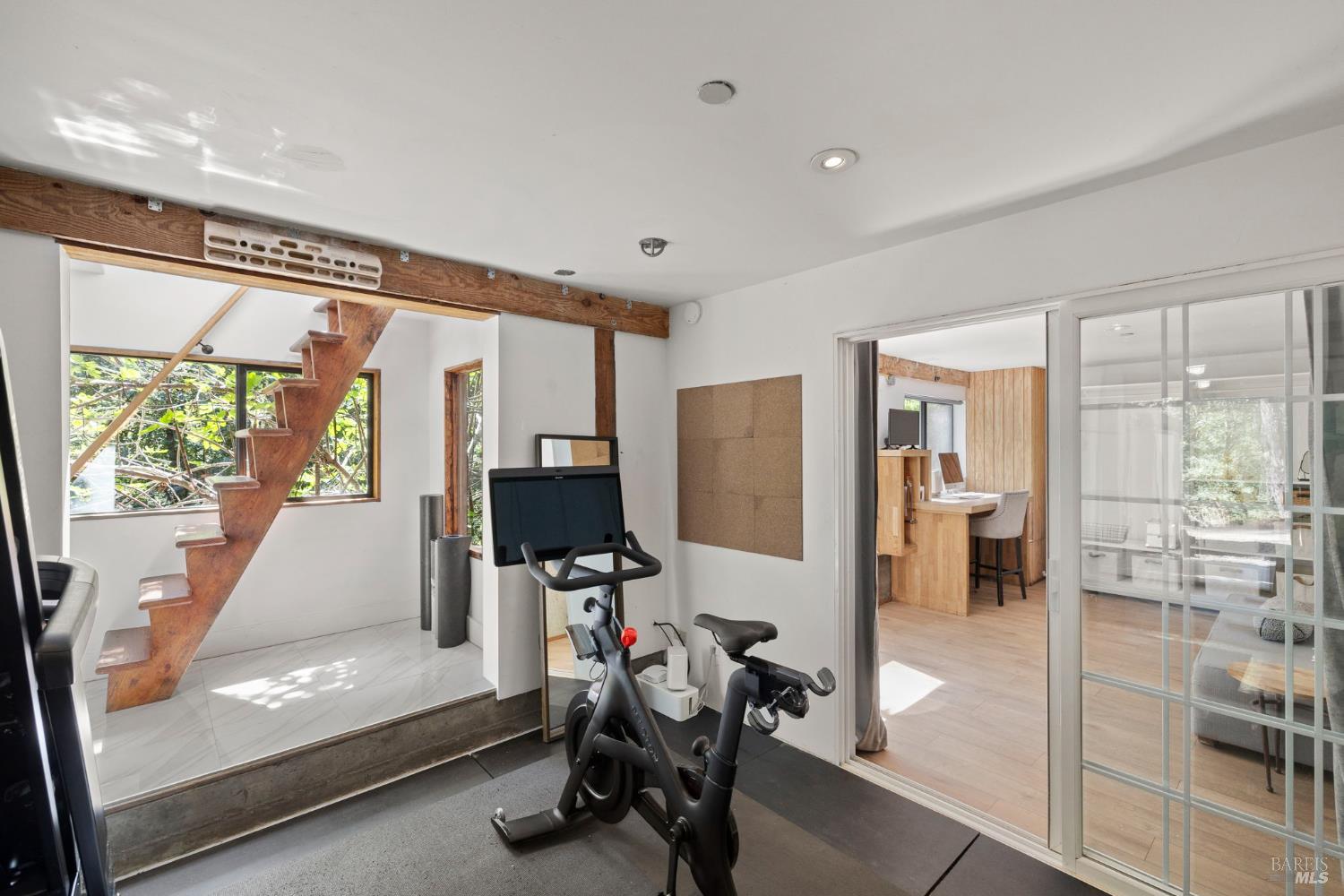 16798 Armstrong Woods Road Guerneville, CA 95446 - Photo 47 of 71 a view of a workspace with furniture and a window