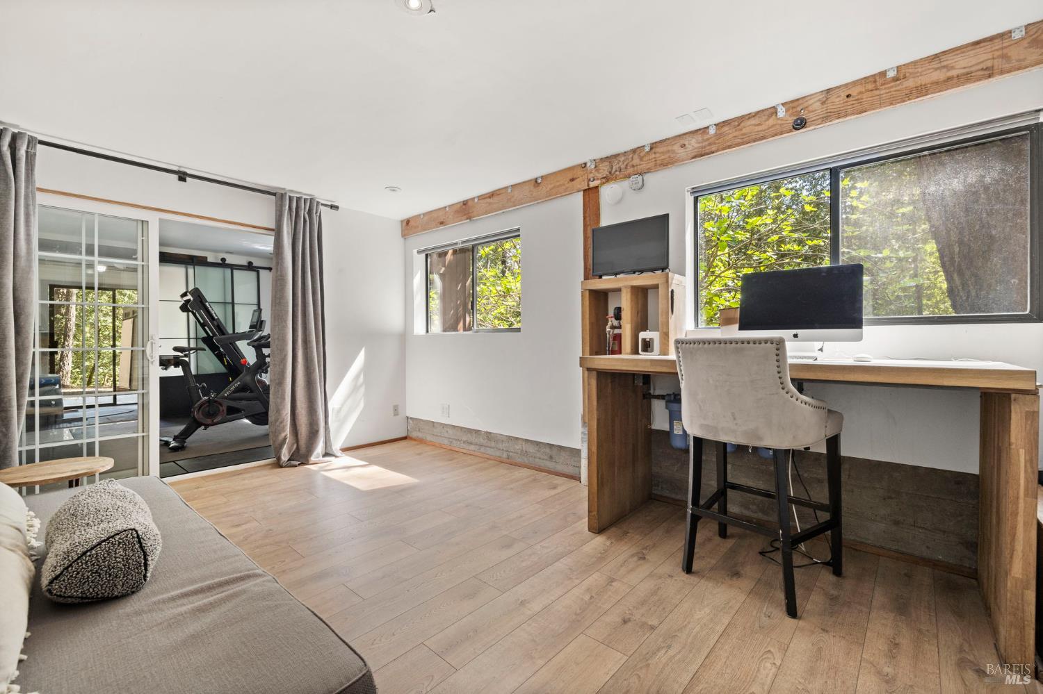 16798 Armstrong Woods Road Guerneville, CA 95446 - Photo 49 of 71 a workspace with furniture window and wooden floor