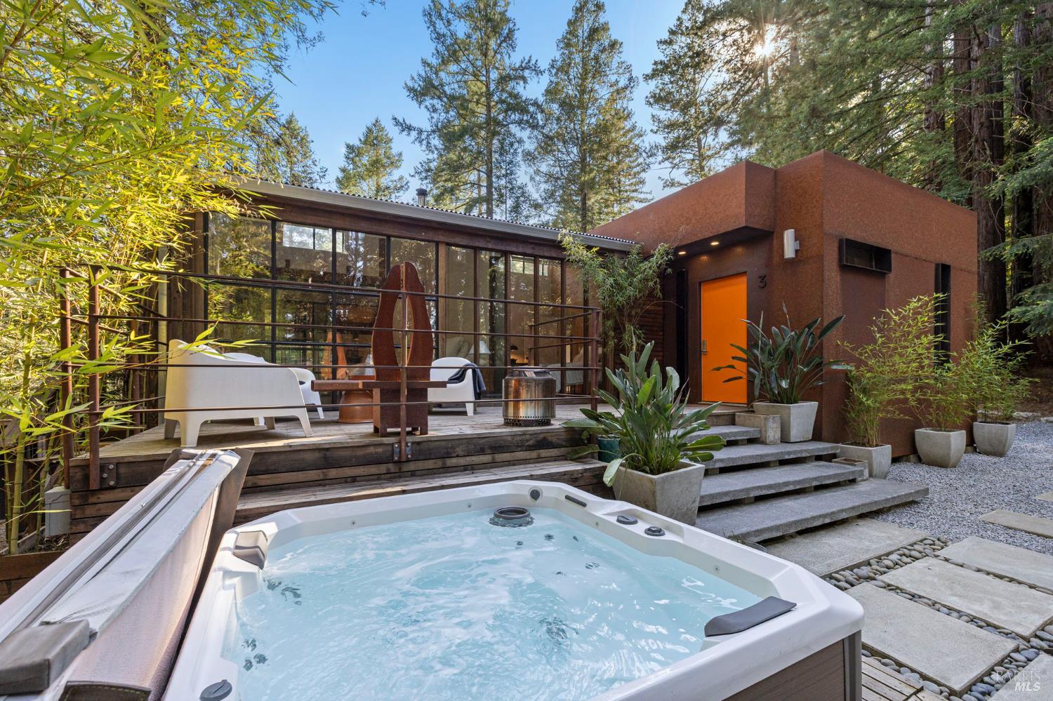 16798 Armstrong Woods Road Guerneville, CA 95446 - Photo 55 of 71 a view of a house with backyard and sitting area
