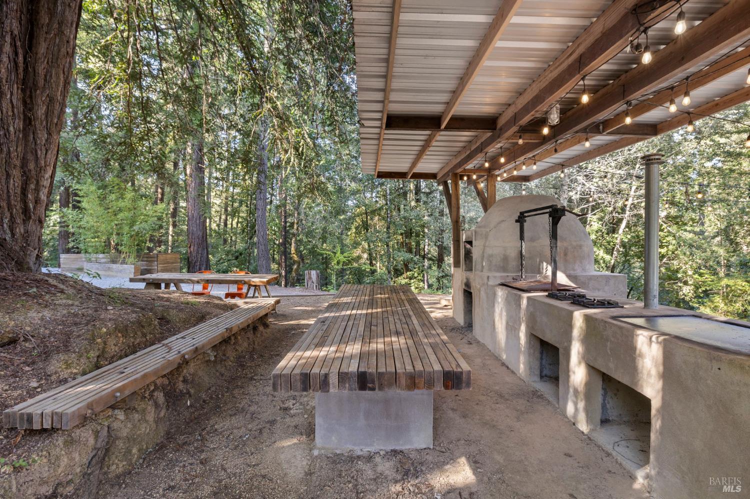 16798 Armstrong Woods Road Guerneville, CA 95446 - Photo 58 of 71 a view of a backyard with sitting area