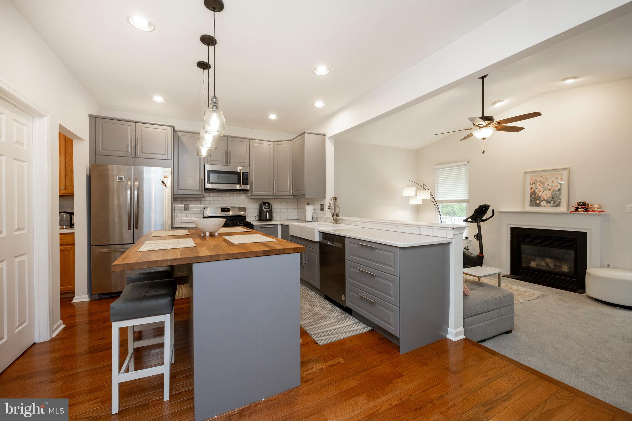 108 Brandywine Road Malvern, PA 19355 - Photo 11 of 35 a kitchen with kitchen island a counter top space a sink stainless steel appliances and cabinets