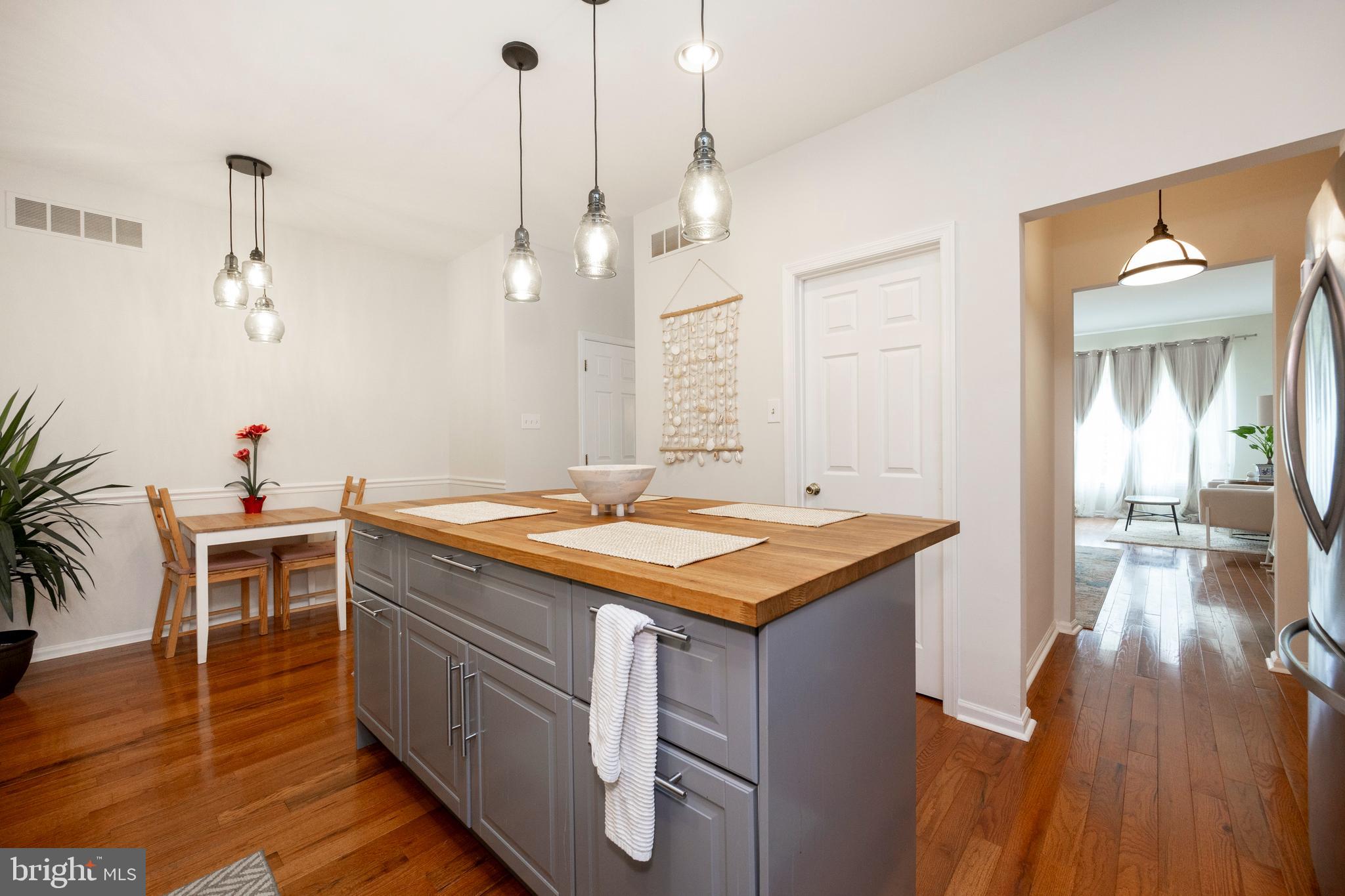 108 Brandywine Road Malvern, PA 19355 - Photo 12 of 35 a kitchen with a stove and wooden floor