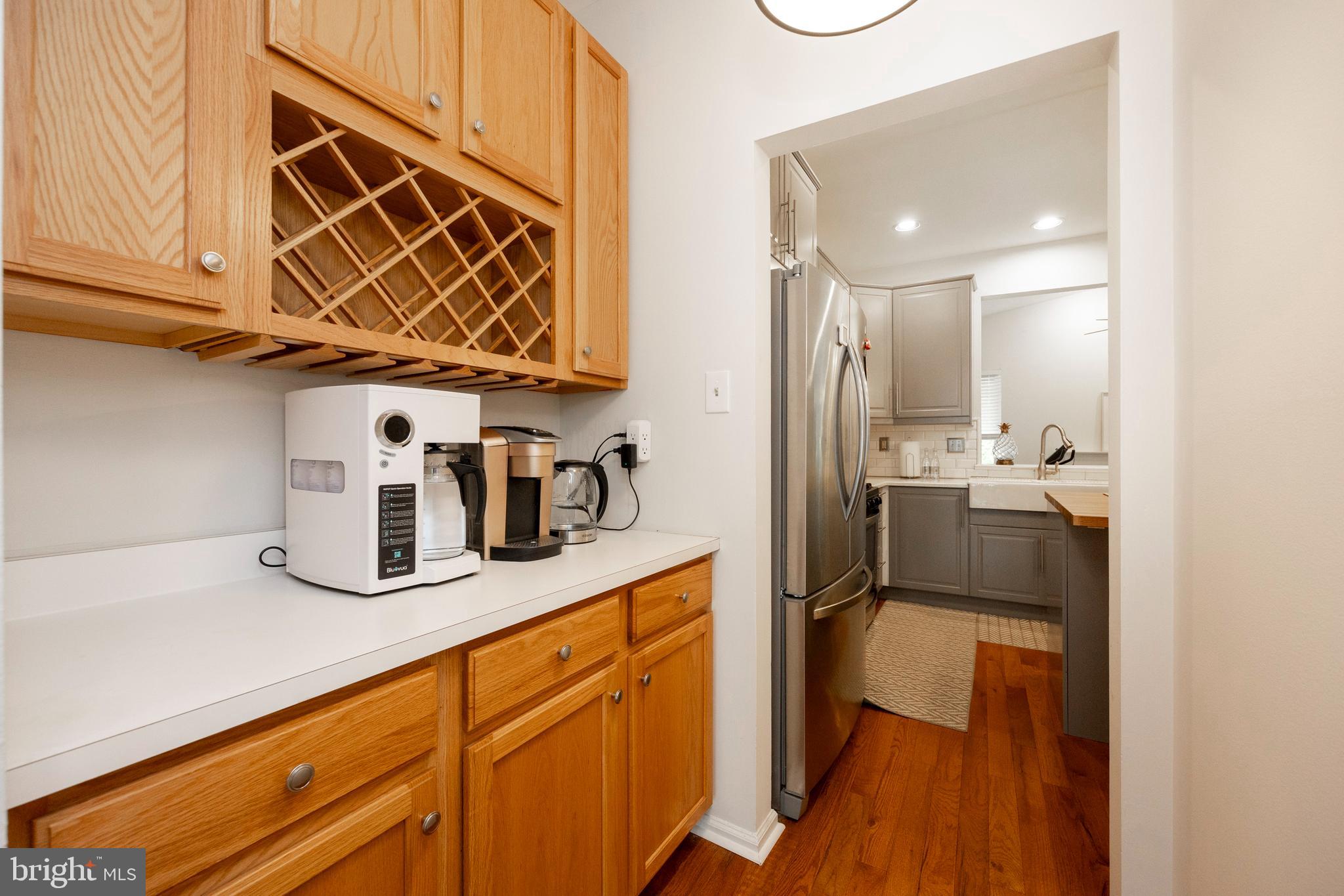 108 Brandywine Road Malvern, PA 19355 - Photo 15 of 35 a kitchen with refrigerator and cabinets