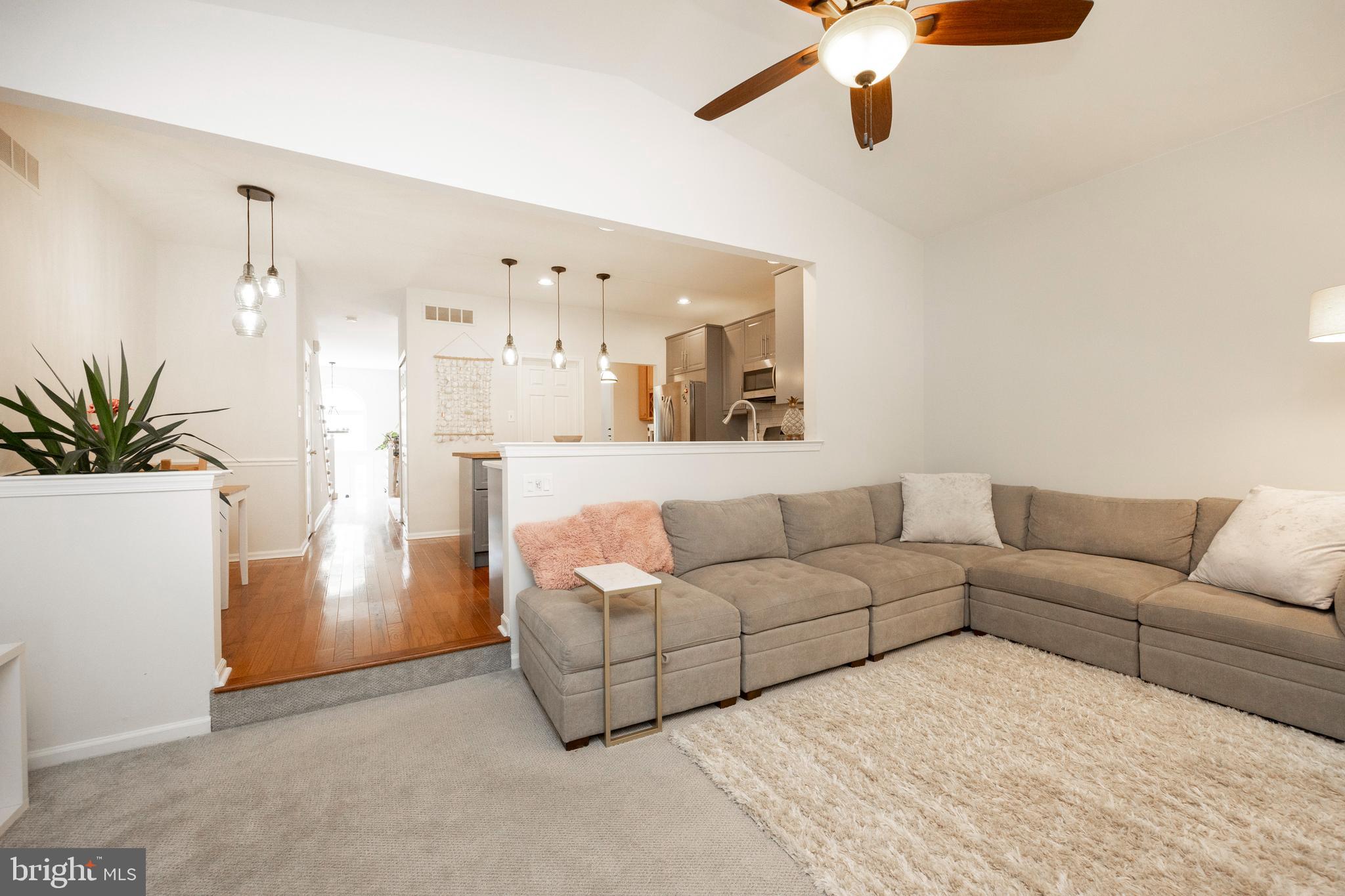 108 Brandywine Road Malvern, PA 19355 - Photo 16 of 35 a living room with furniture and a chandelier