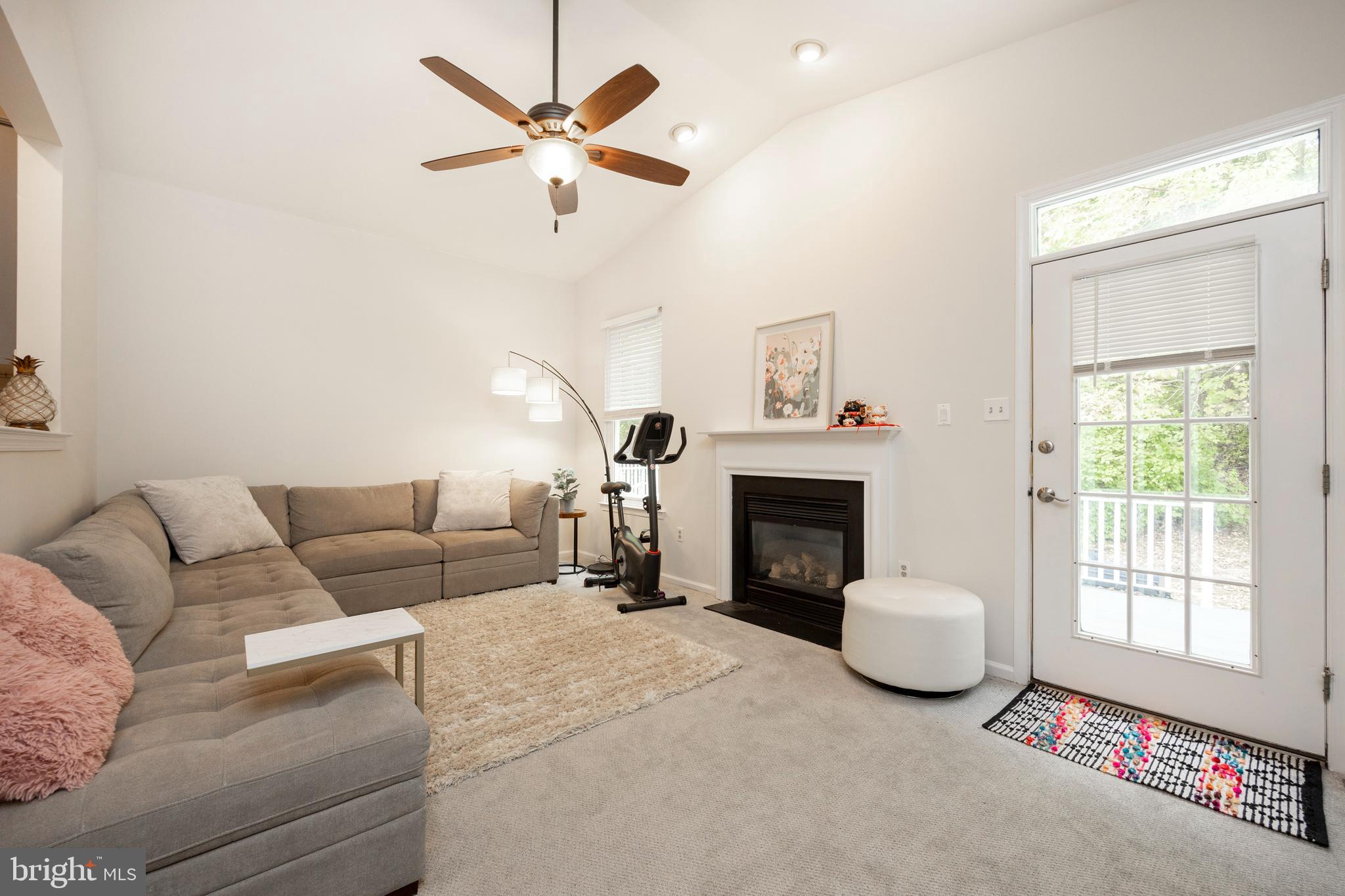 108 Brandywine Road Malvern, PA 19355 - Photo 18 of 35 a living room with furniture a fireplace and a window
