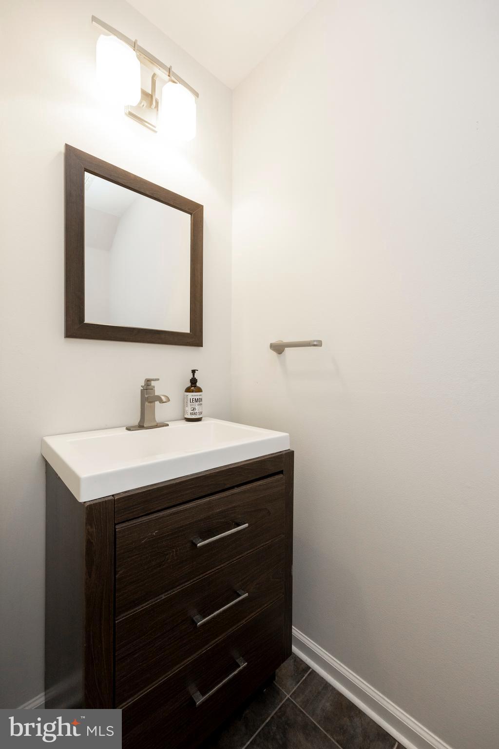 108 Brandywine Road Malvern, PA 19355 - Photo 19 of 35 a bathroom with a sink and a mirror