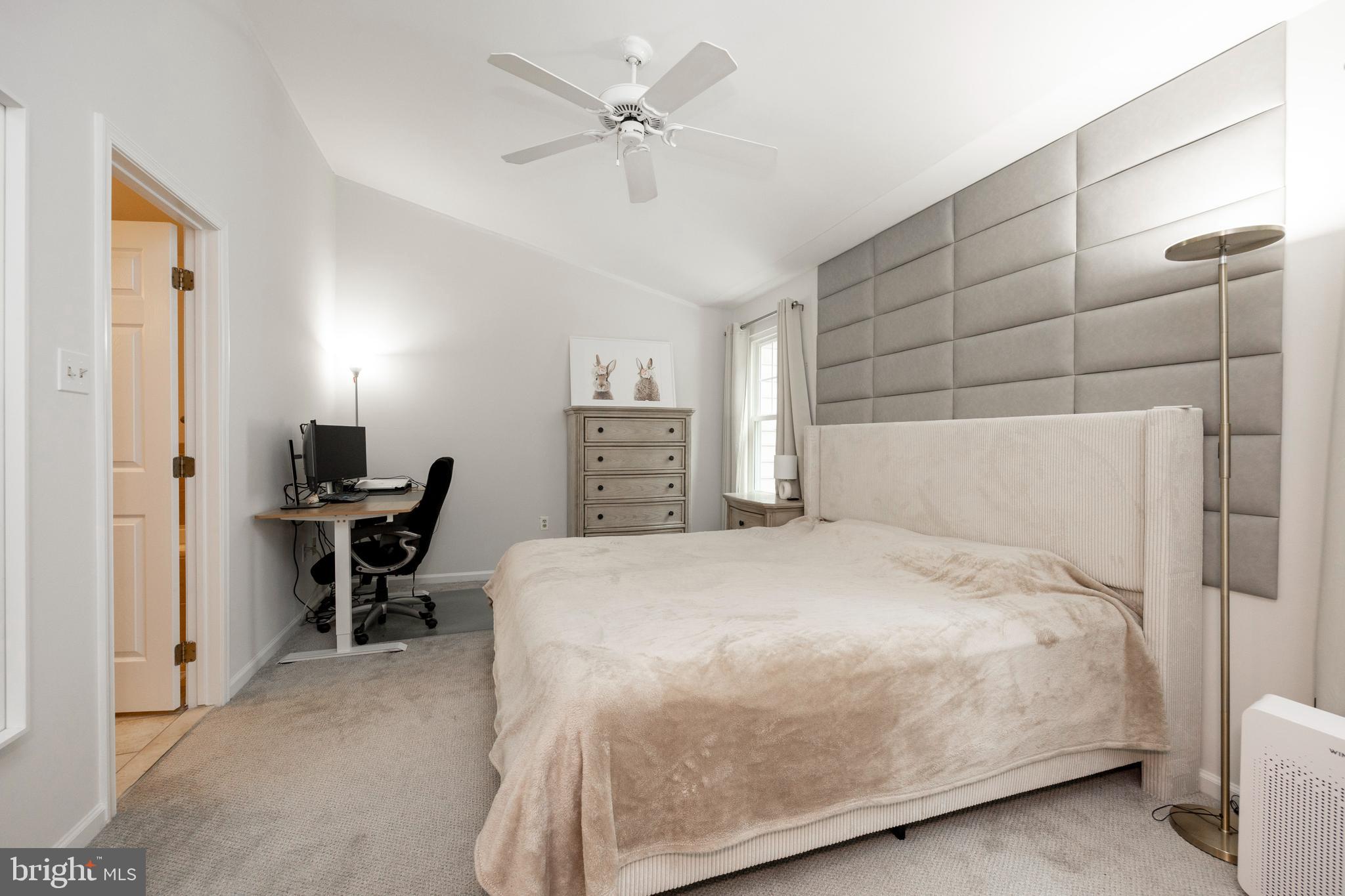 108 Brandywine Road Malvern, PA 19355 - Photo 22 of 35 a bedroom with a bed and a table in it