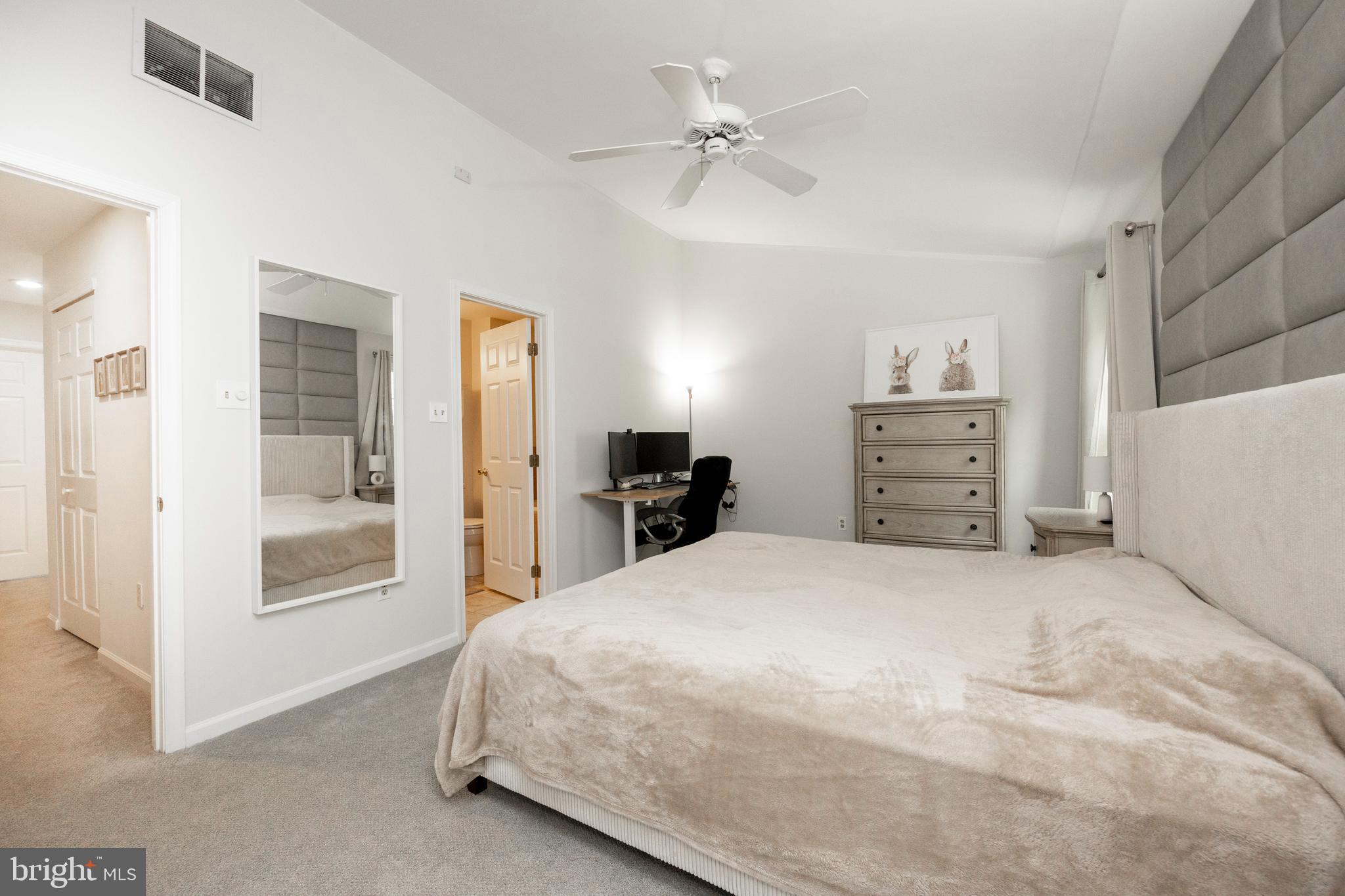 108 Brandywine Road Malvern, PA 19355 - Photo 23 of 35 a bedroom with a bed and a chandelier