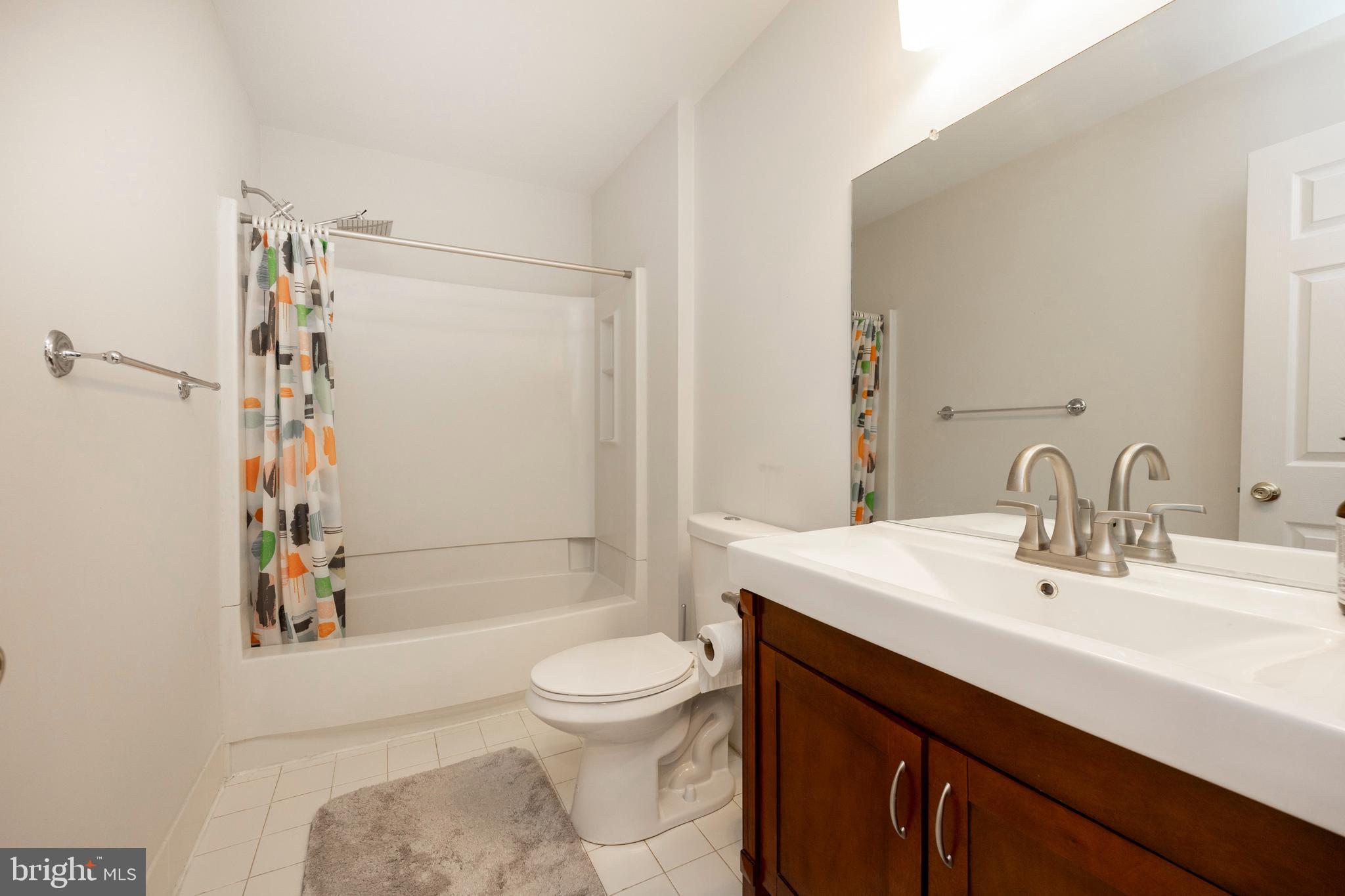 108 Brandywine Road Malvern, PA 19355 - Photo 27 of 35 a bathroom with a sink a toilet and shower