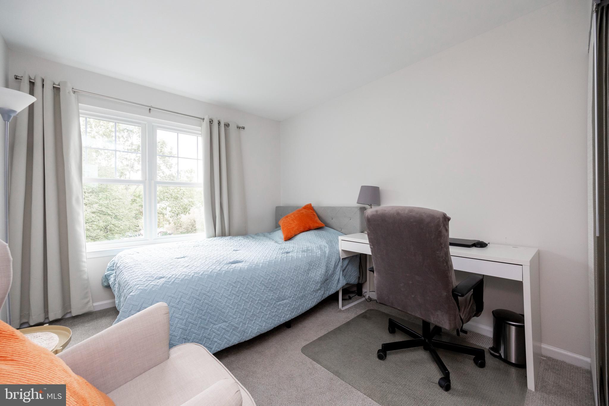 108 Brandywine Road Malvern, PA 19355 - Photo 28 of 35 a bedroom with a bed and a desk