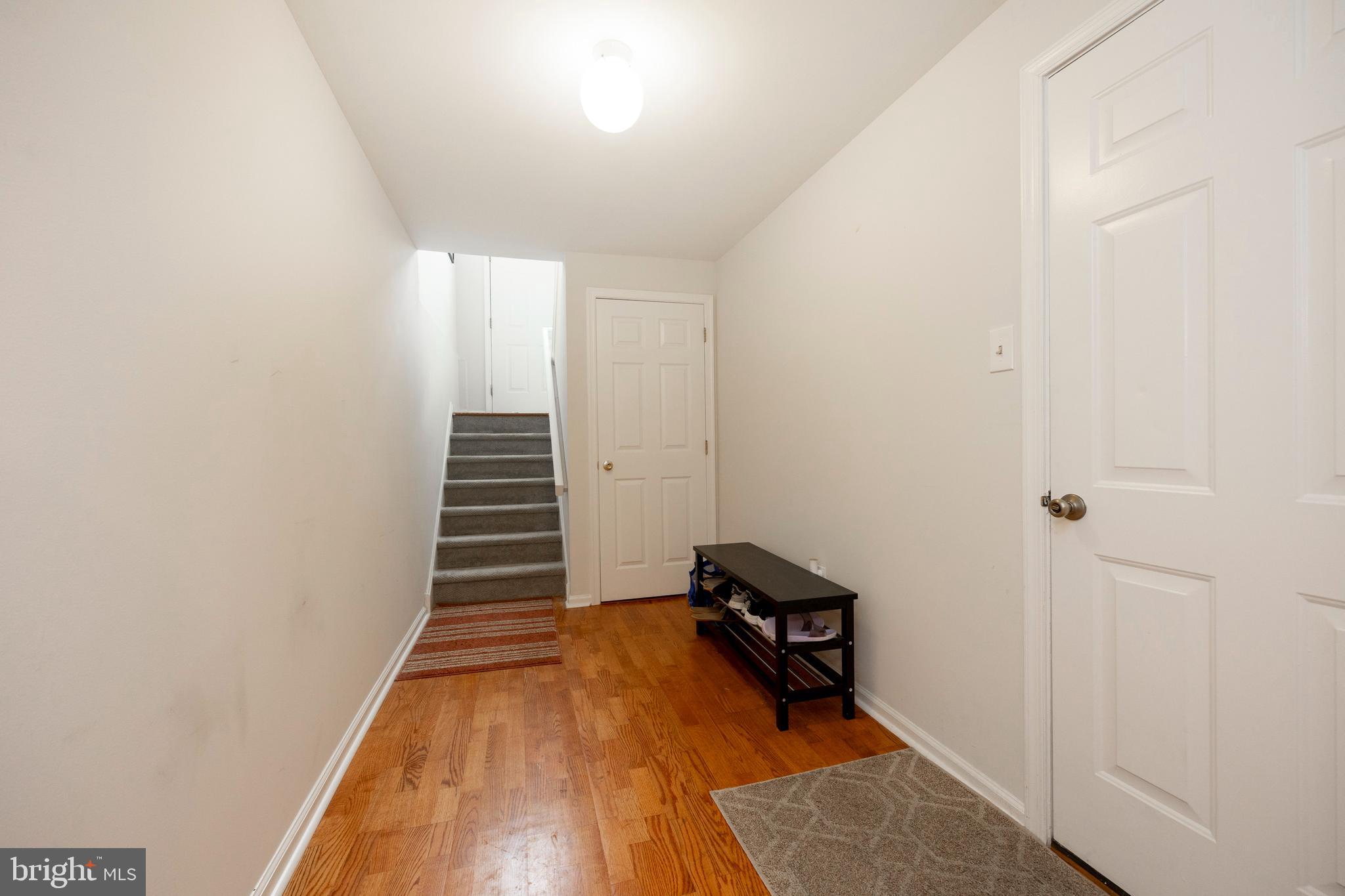 108 Brandywine Road Malvern, PA 19355 - Photo 29 of 35 a view of a room with wooden floor and stairs