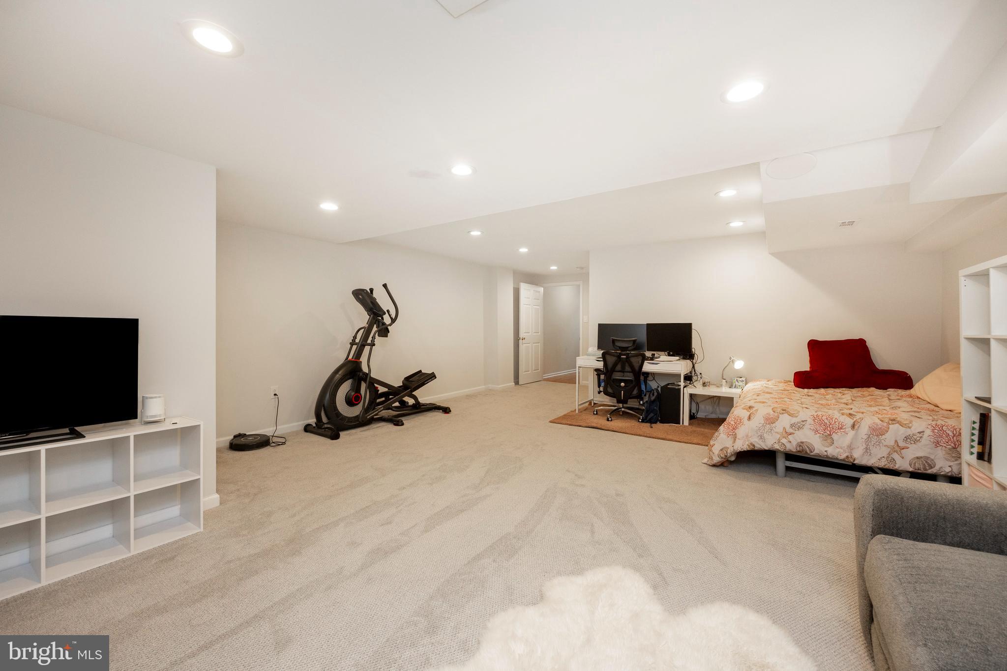 108 Brandywine Road Malvern, PA 19355 - Photo 30 of 35 a room with furniture and a flat screen tv