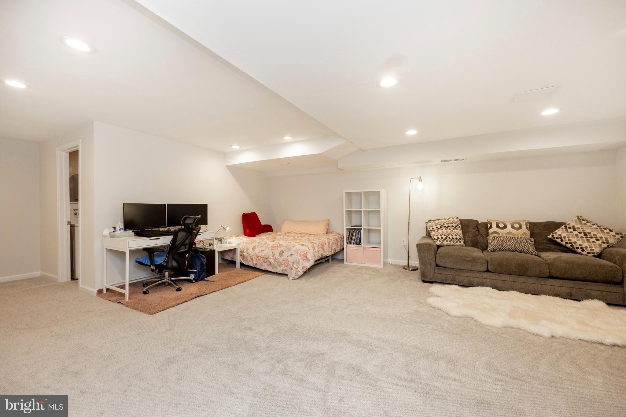 108 Brandywine Road Malvern, PA 19355 - Photo 32 of 35 a living room with furniture and a flat screen tv