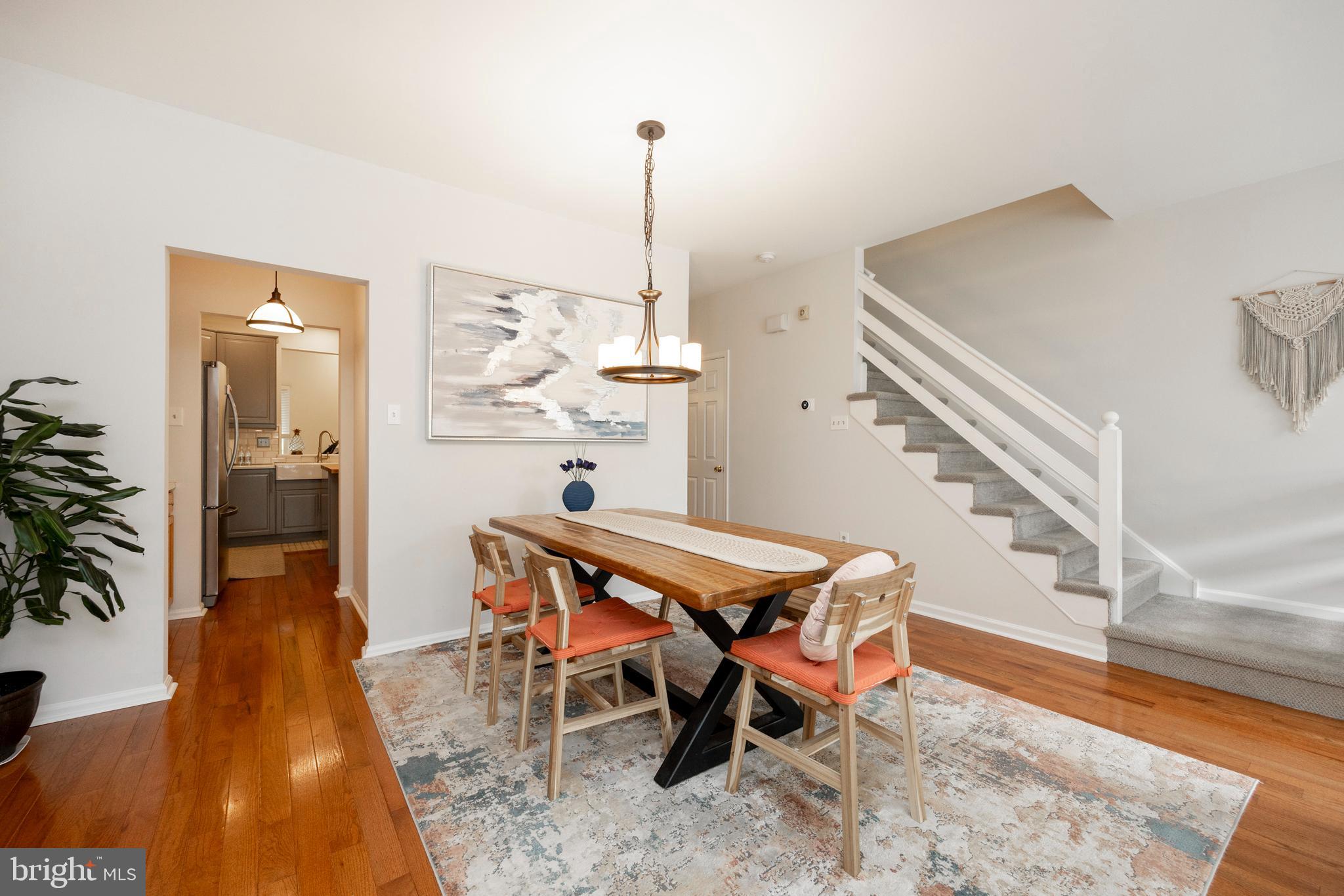 108 Brandywine Road Malvern, PA 19355 - Photo 5 of 35 a dining room with furniture and wooden floor