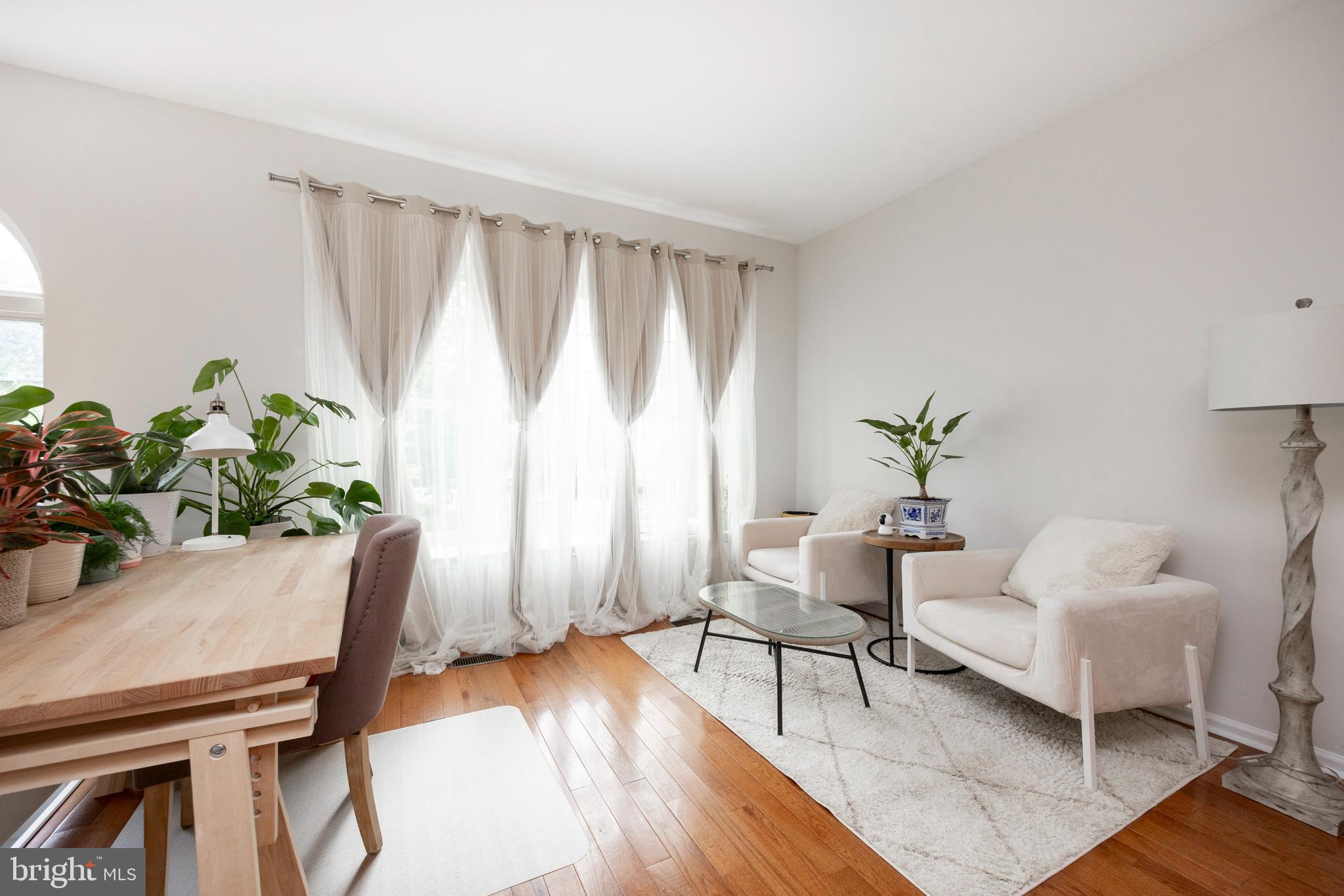 108 Brandywine Road Malvern, PA 19355 - Photo 6 of 35 a living room with furniture and a potted plant