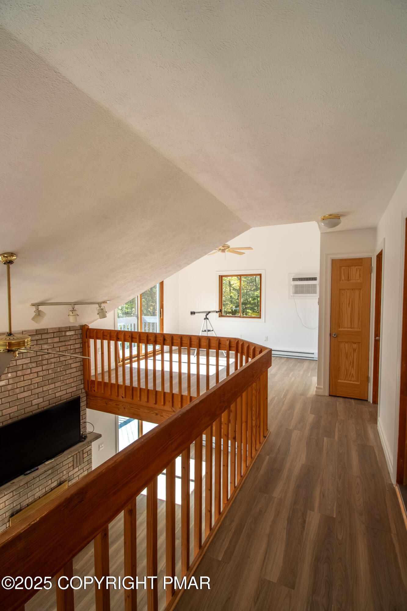 1142 Yorkshire Lane Bushkill, PA 18324 - Photo 23 of 72 a view of balcony with wooden floor