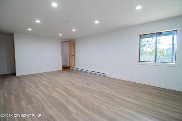 a view of a backyard with a small pool