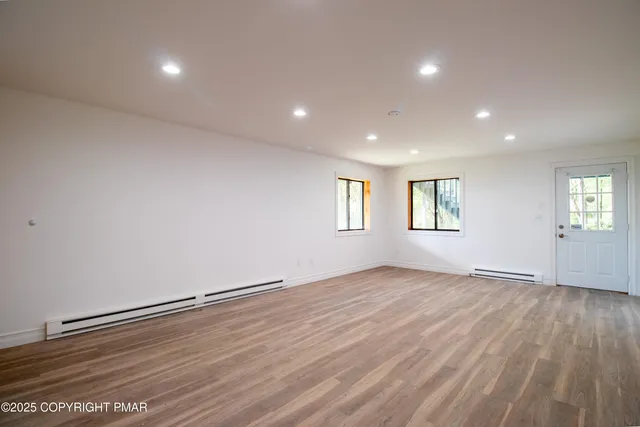 a view of an outdoor space and tennis court