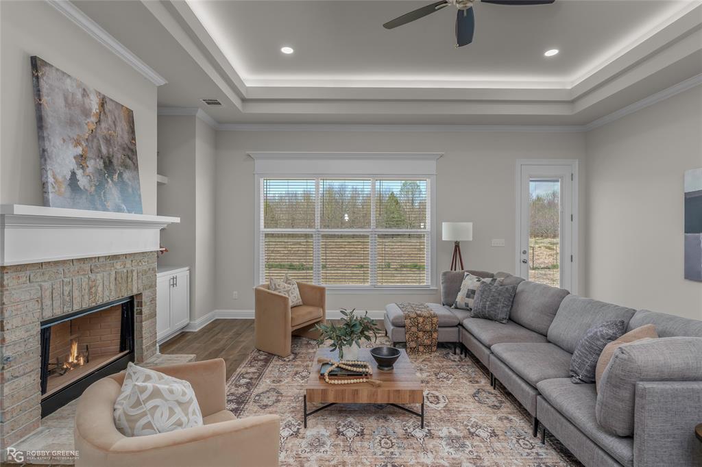 316 Peason Ridge Bossier City, LA 71112 - Photo 16 of 36 a living room with furniture and a fireplace