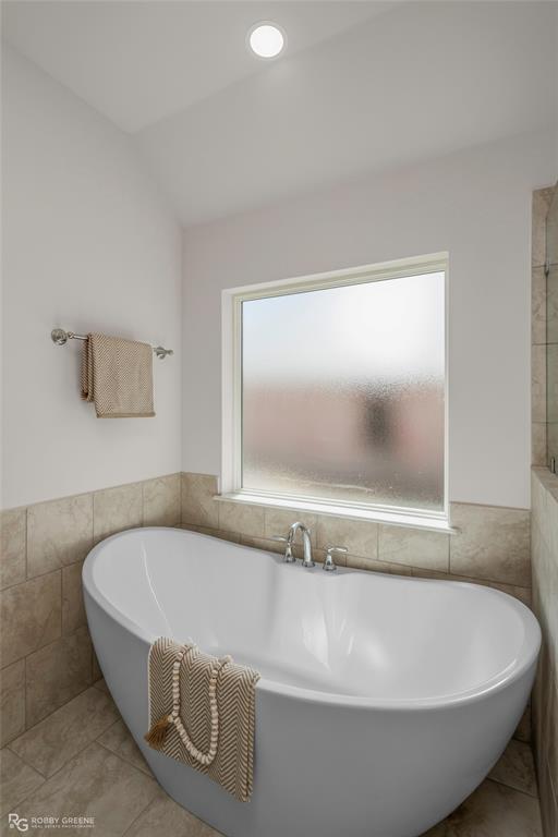316 Peason Ridge Bossier City, LA 71112 - Photo 25 of 36 a white bath tub sitting in a bathroom
