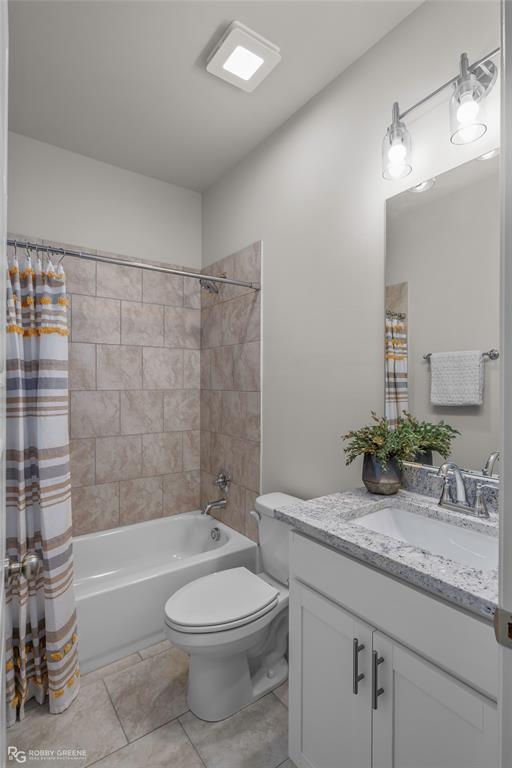 316 Peason Ridge Bossier City, LA 71112 - Photo 29 of 36 a bathroom with a granite countertop sink a toilet a mirror a bathtub and shower
