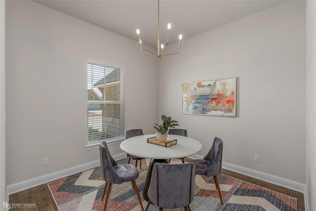 316 Peason Ridge Bossier City, LA 71112 - Photo 9 of 36 a view of a dining room with furniture window and wooden floor