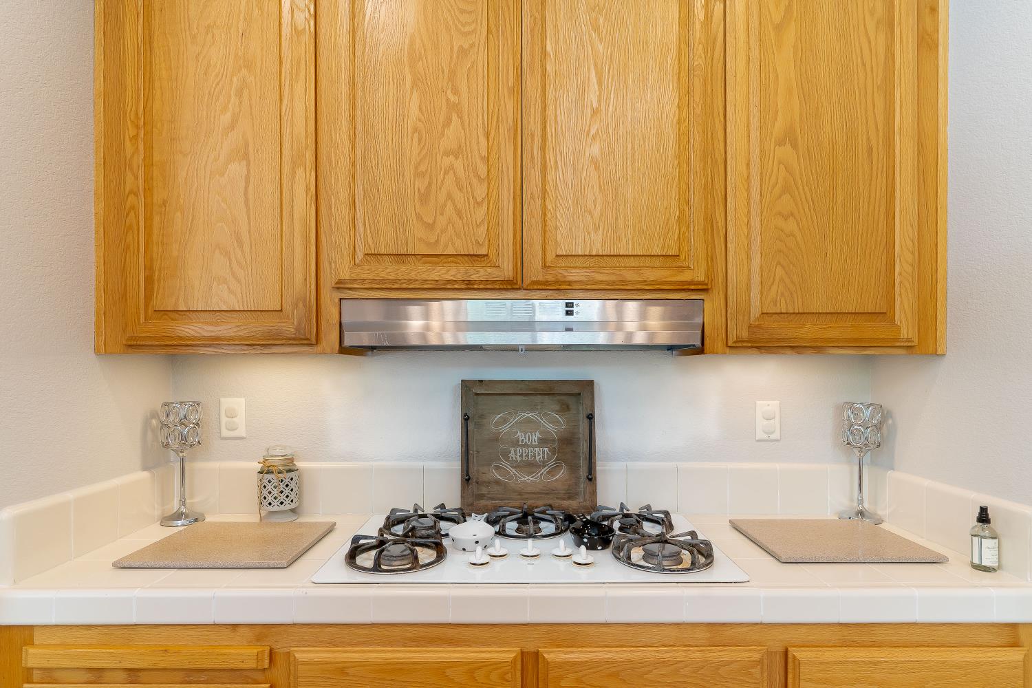 34676 Canvas Back Street Woodland, CA 95695 - Photo 25 of 28 a kitchen with a sink cabinets and a wooden floor