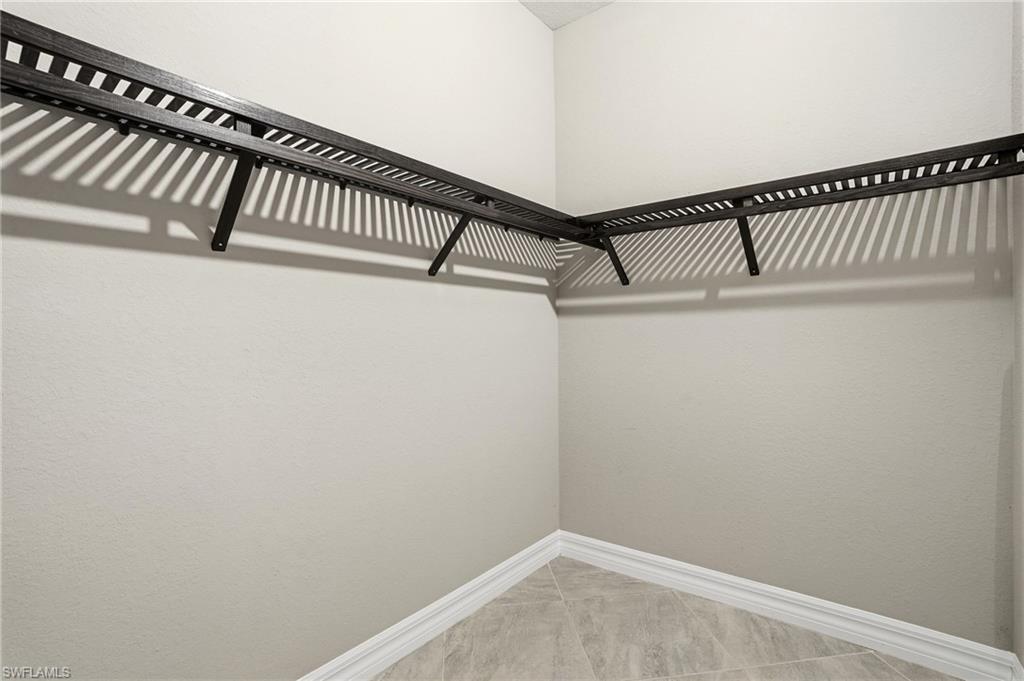 28076 Foxrock Court Bonita Springs, FL 34135 - Photo 27 of 50 View of walk in closet