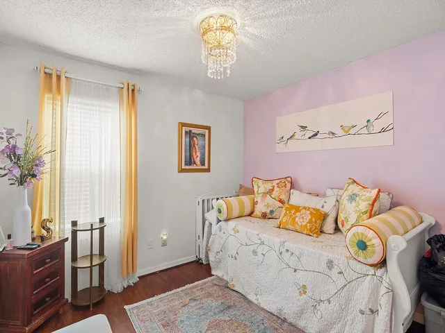 a living room with furniture and window