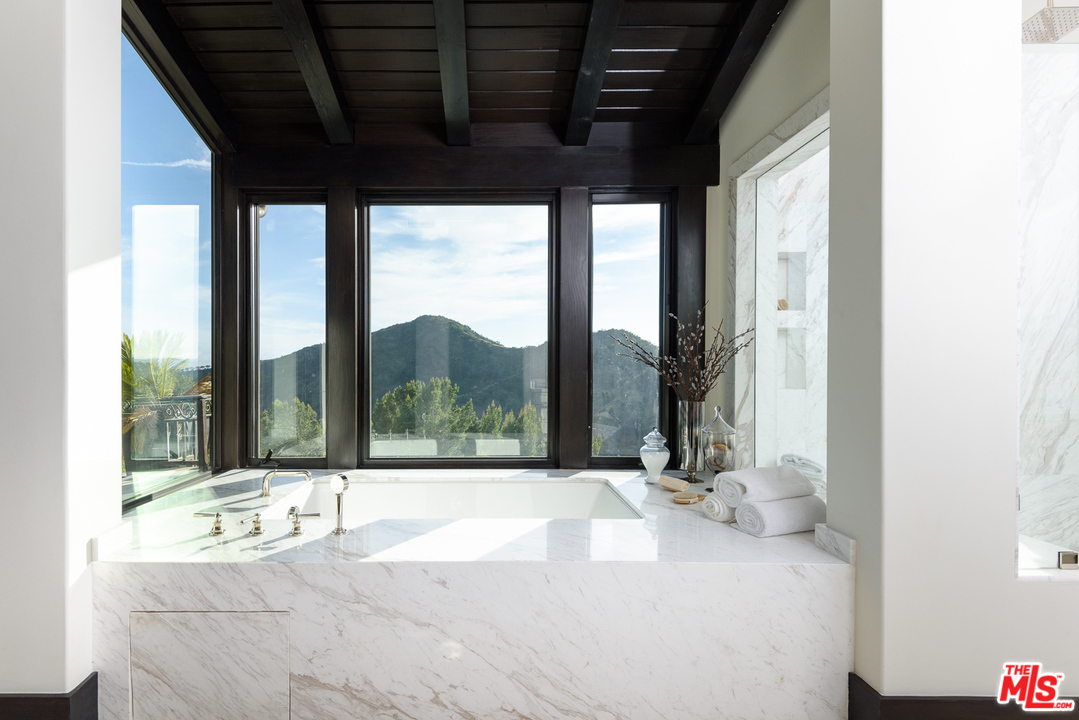2175 Summitridge Drive Beverly Hills, CA 90210 - Photo 29 of 51 a view of a living room and window
