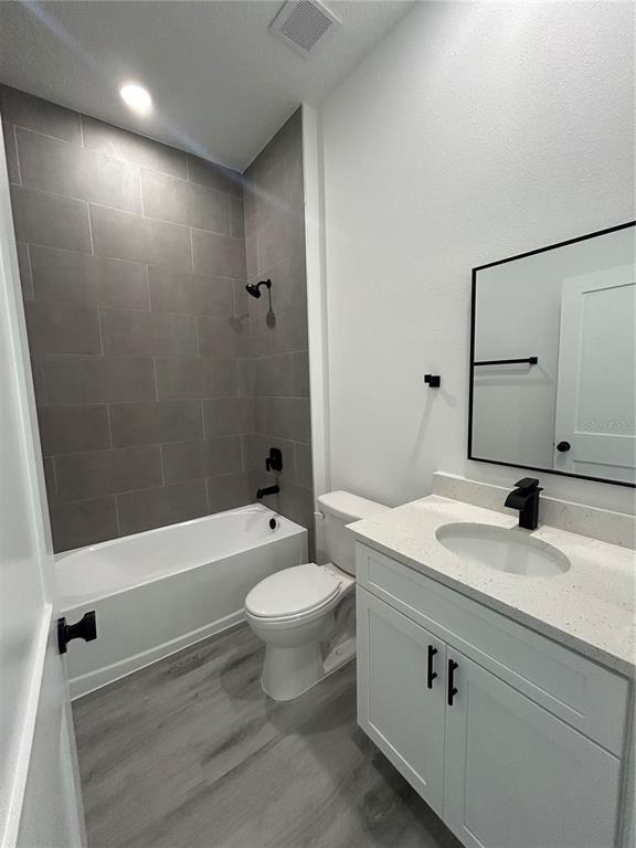 555 Marion Oaks Golf Road Ocala, FL 34473 - Photo 26 of 34 a bathroom with a sink a toilet and a bathtub