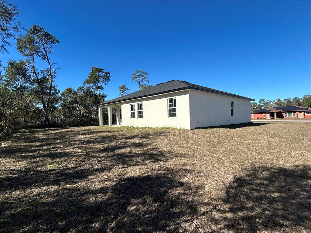 555 Marion Oaks Golf Road Ocala, FL 34473 - Photo 34 of 34 a view of a house with a snow