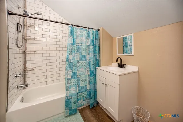 a room with toys and a bed