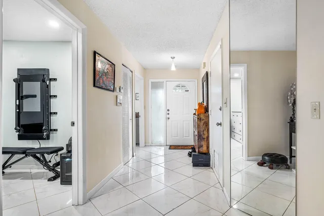 a view of a livingroom with a furniture and entryway