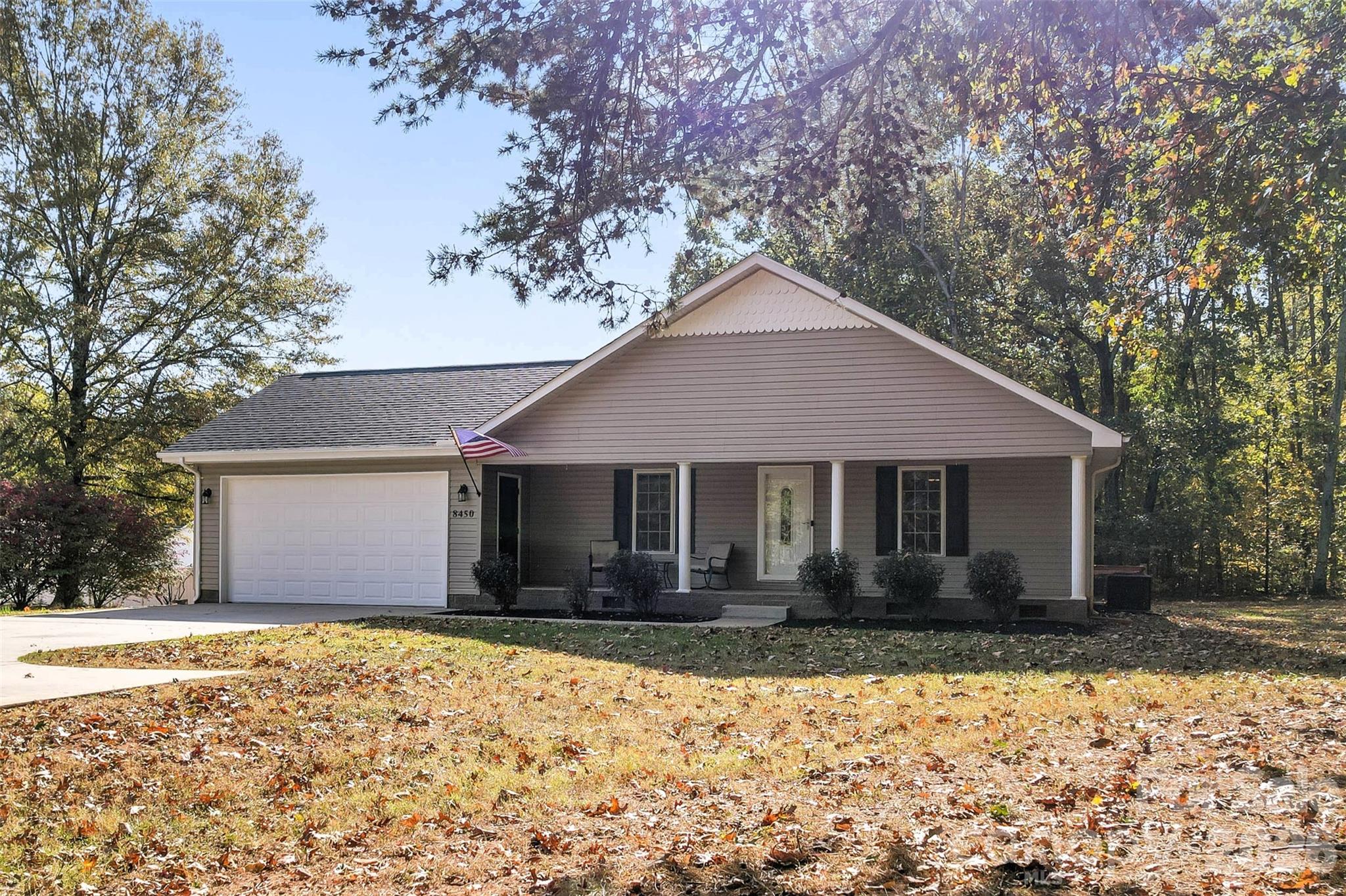 8450 Red Road Rockwell, NC 28138 - Photo 1 of 48 a front view of house with yard and trees around