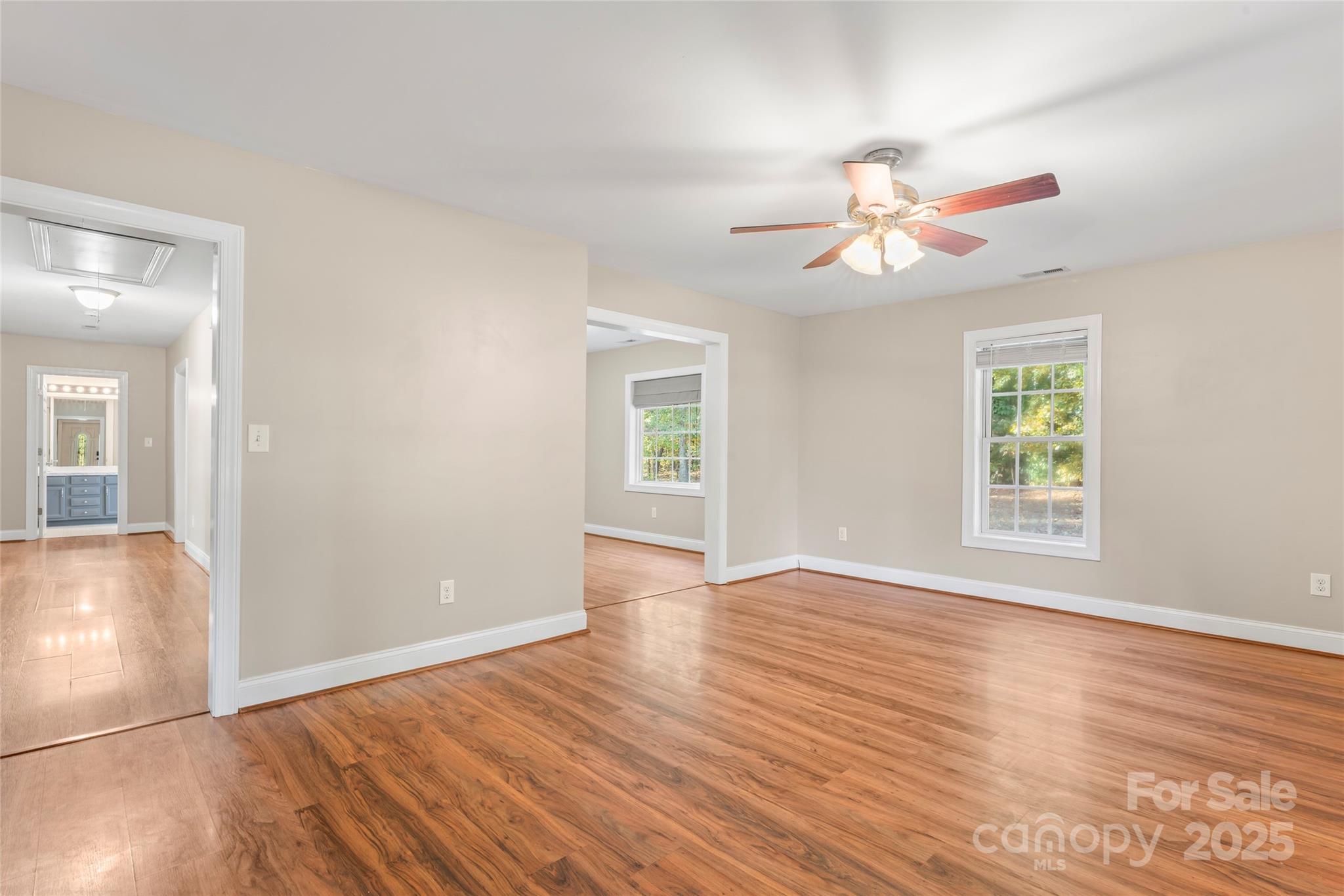 8450 Red Road Rockwell, NC 28138 - Photo 11 of 48 a view of an empty room with window and wooden floor