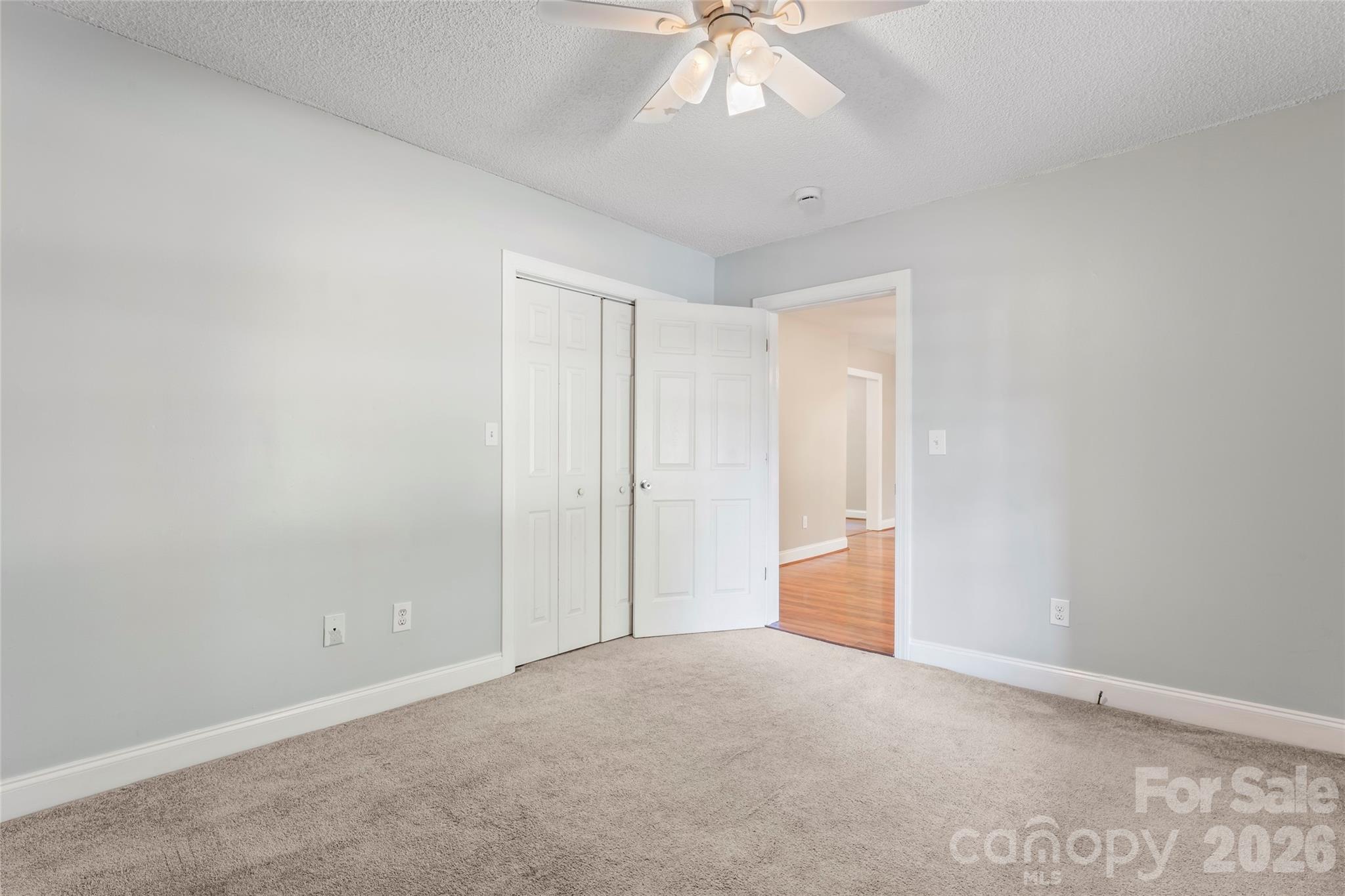 8450 Red Road Rockwell, NC 28138 - Photo 17 of 48 a view of an empty room and chandelier fan
