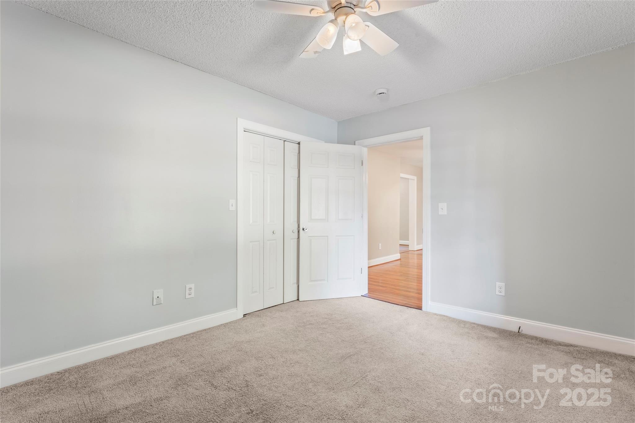 8450 Red Road Rockwell, NC 28138 - Photo 17 of 48 a view of an empty room and chandelier fan