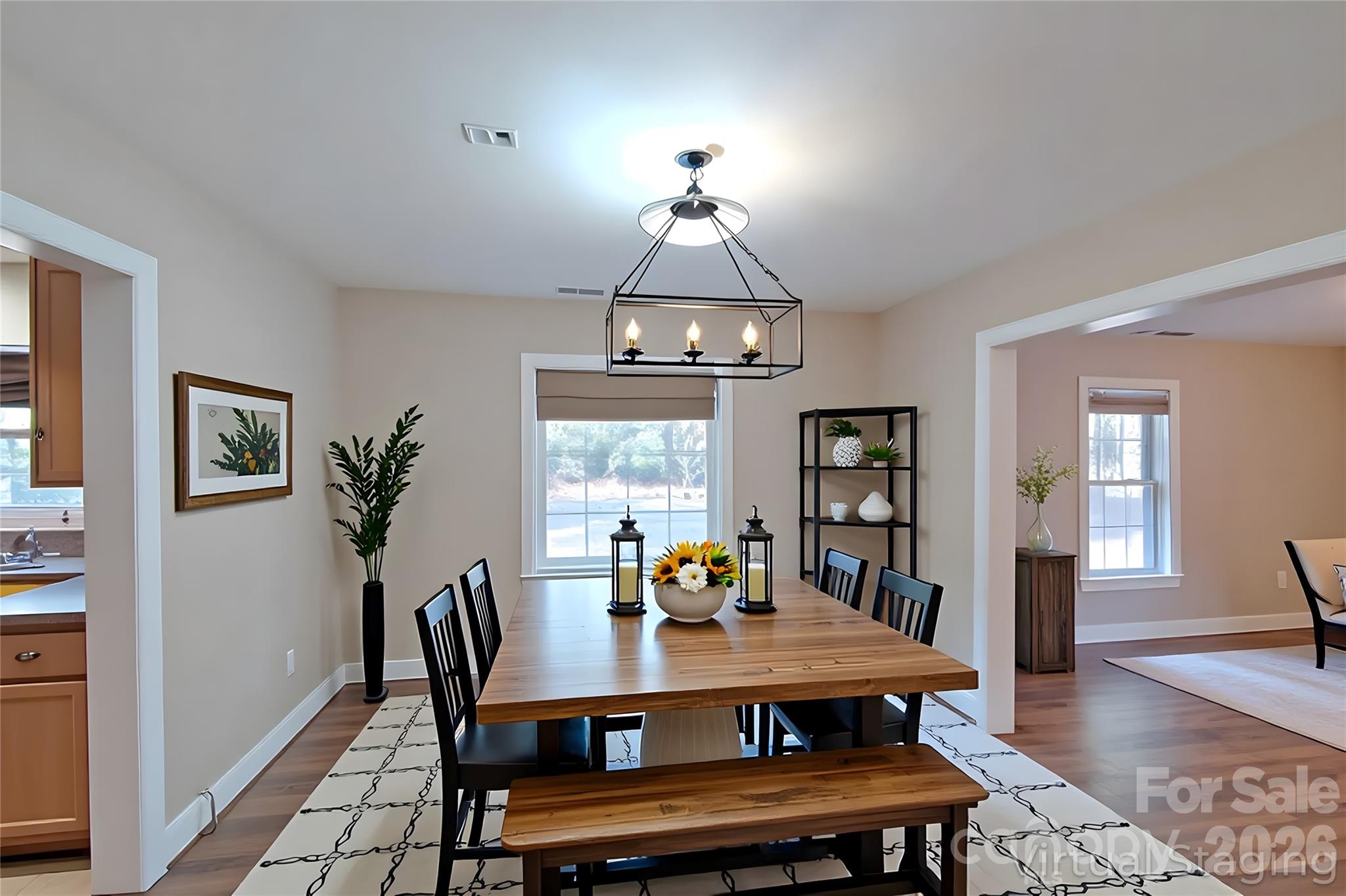 8450 Red Road Rockwell, NC 28138 - Photo 18 of 48 a view of a dining room with furniture window and wooden floor
