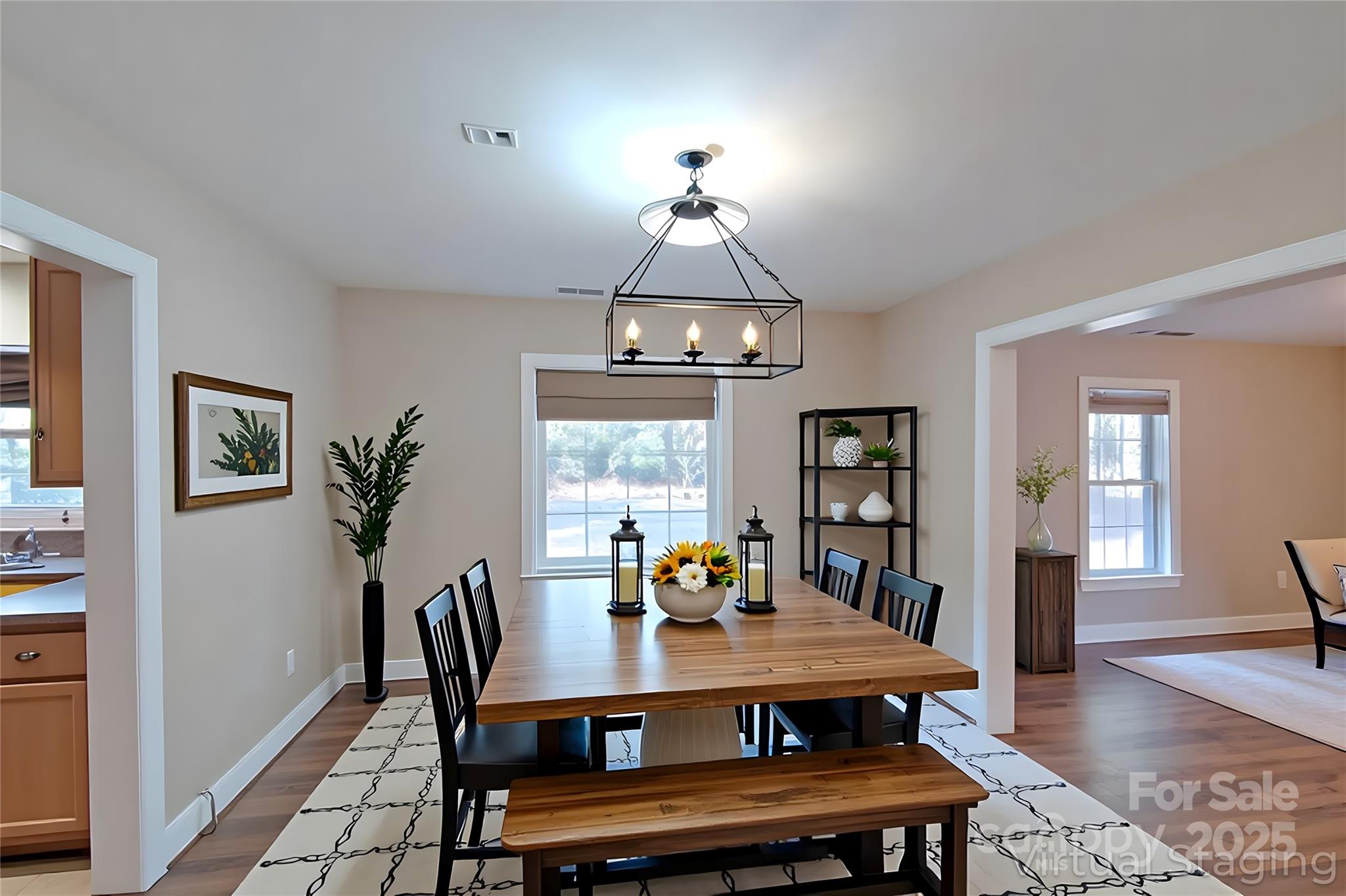 8450 Red Road Rockwell, NC 28138 - Photo 18 of 48 a view of a dining room with furniture window and wooden floor
