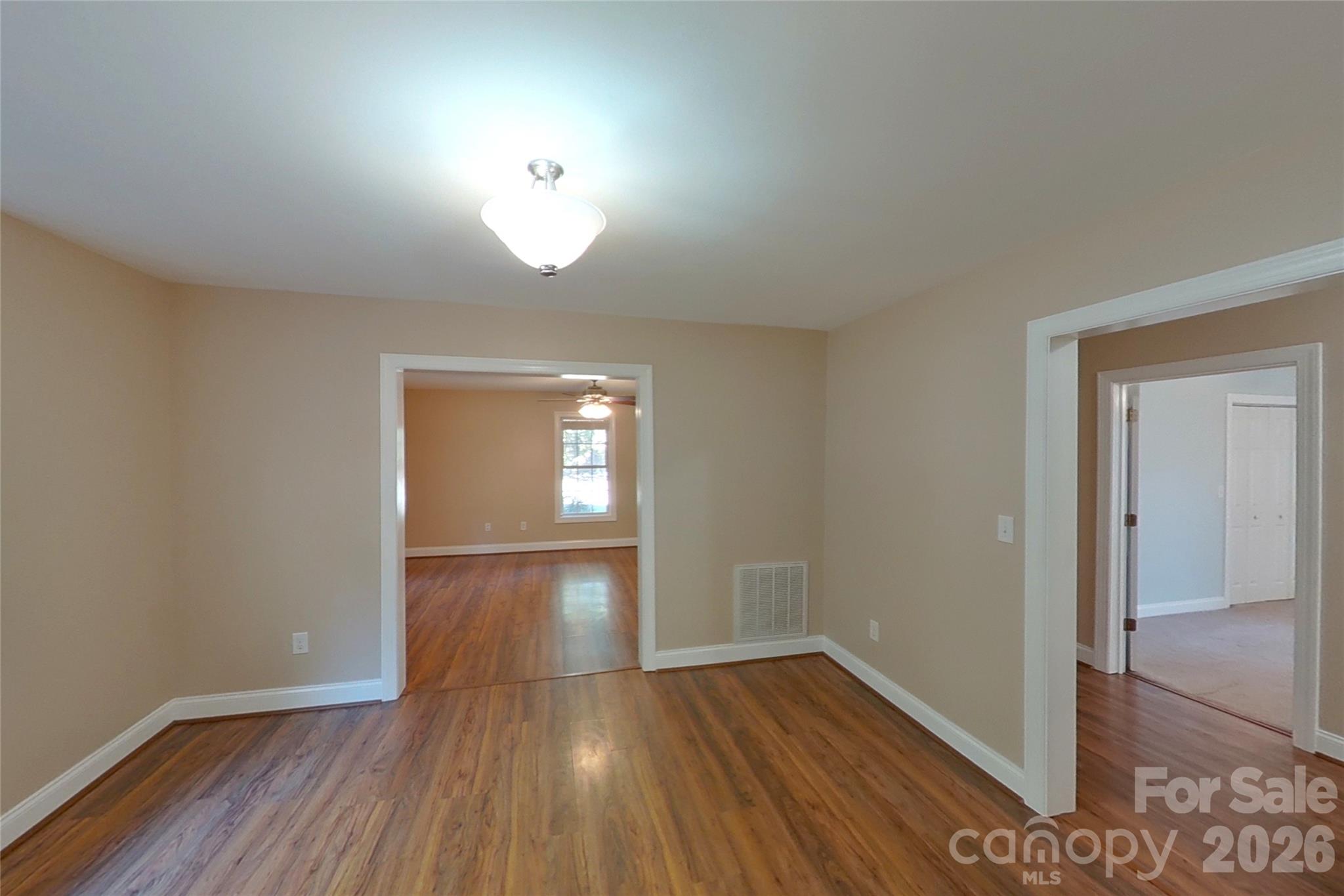 8450 Red Road Rockwell, NC 28138 - Photo 19 of 48 a view of empty room with wooden floor