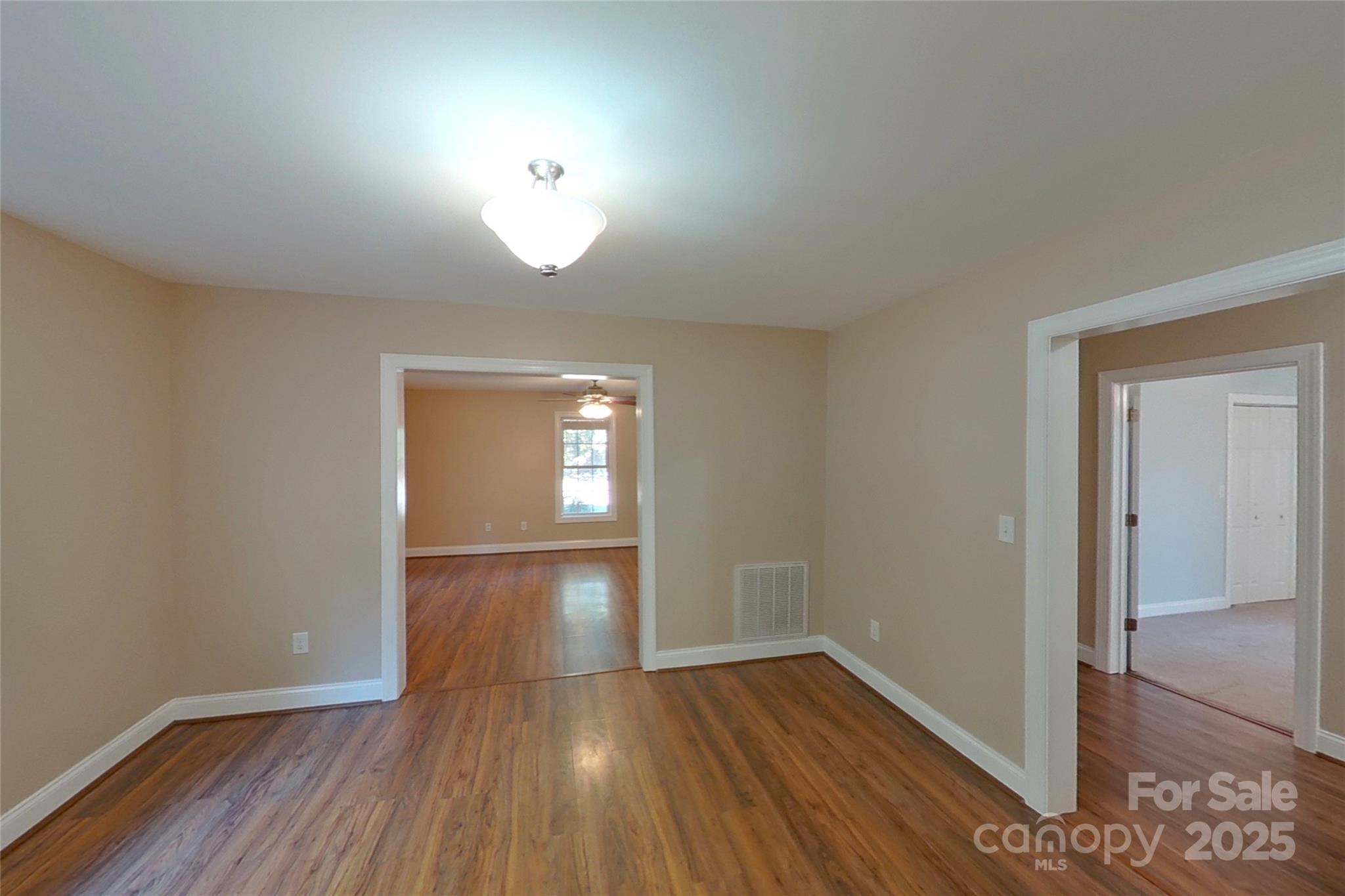 8450 Red Road Rockwell, NC 28138 - Photo 19 of 48 a view of empty room with wooden floor
