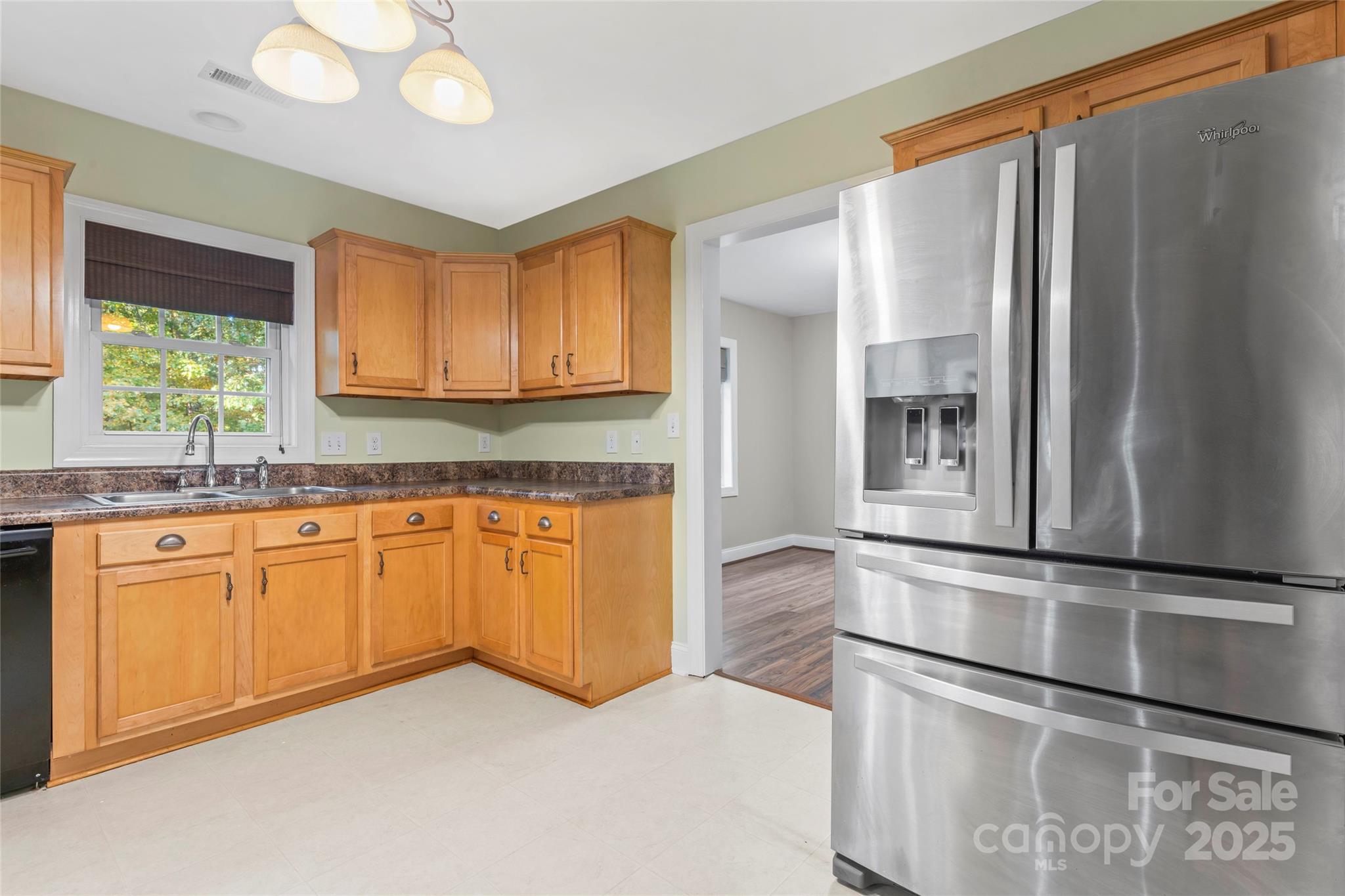 8450 Red Road Rockwell, NC 28138 - Photo 22 of 48 a kitchen with stainless steel appliances granite countertop a refrigerator and cabinets