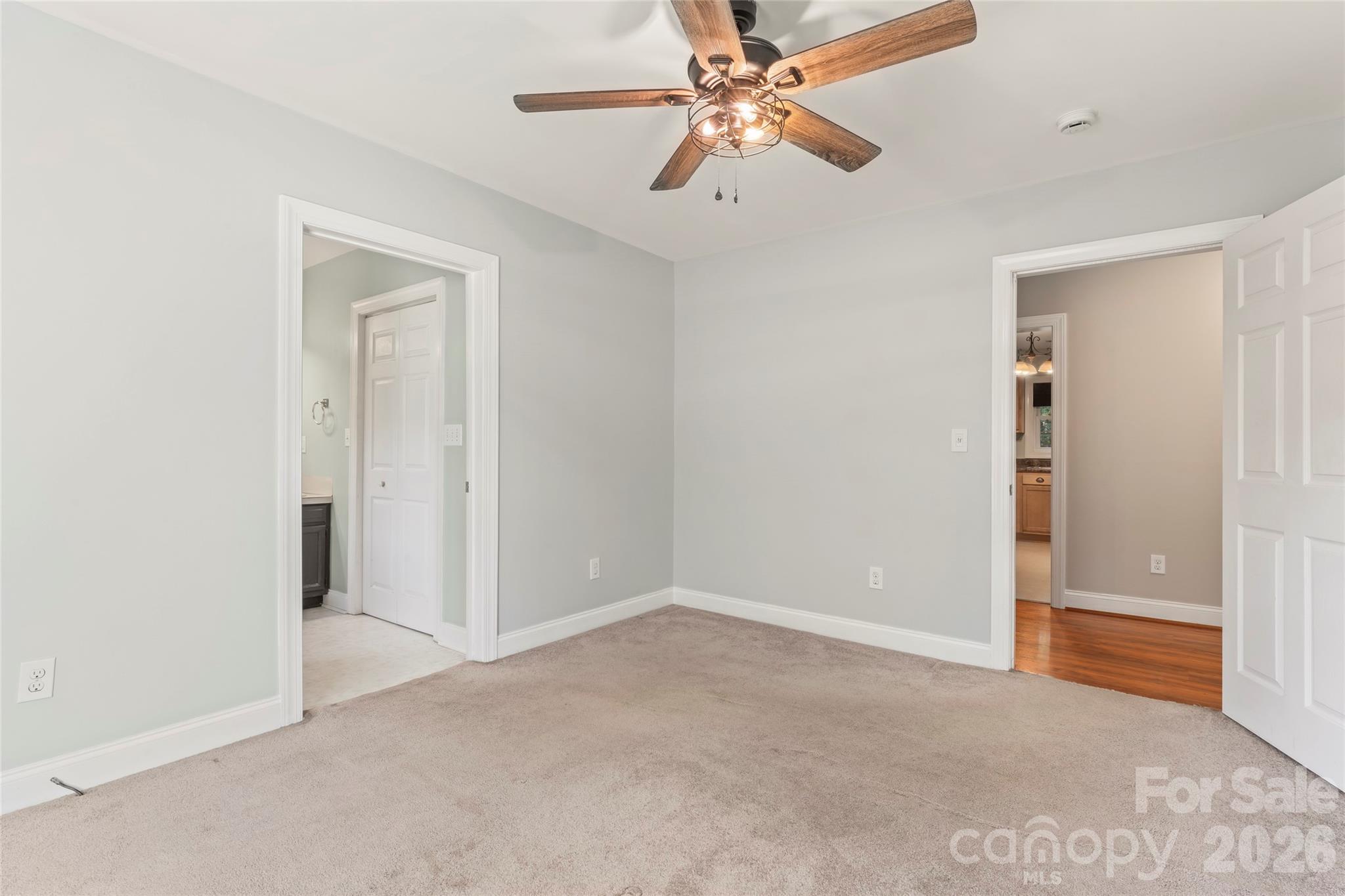 8450 Red Road Rockwell, NC 28138 - Photo 28 of 48 an empty room with closet and a ceiling fan