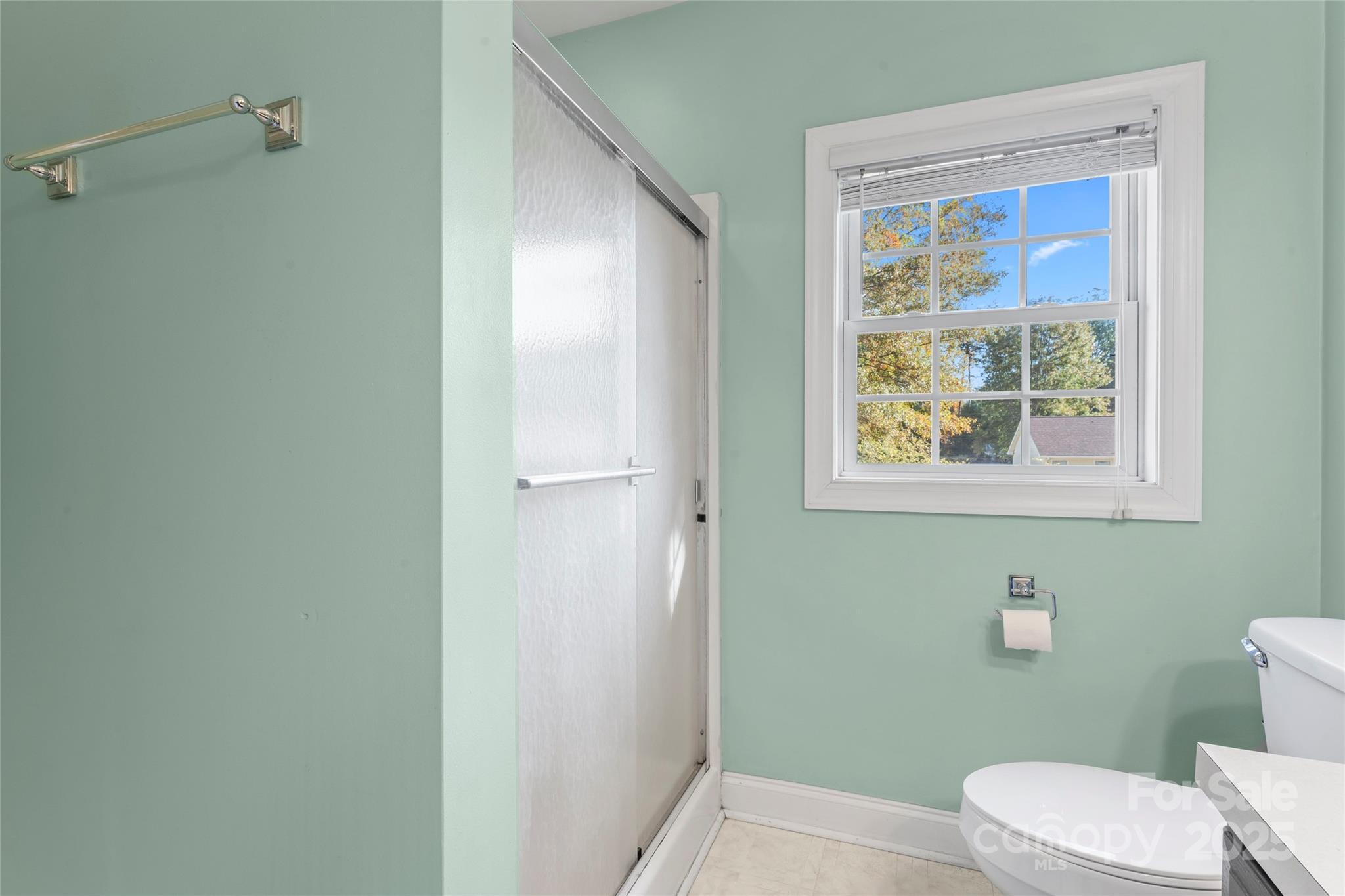 8450 Red Road Rockwell, NC 28138 - Photo 30 of 48 a white toilet sitting next to a bathroom sink