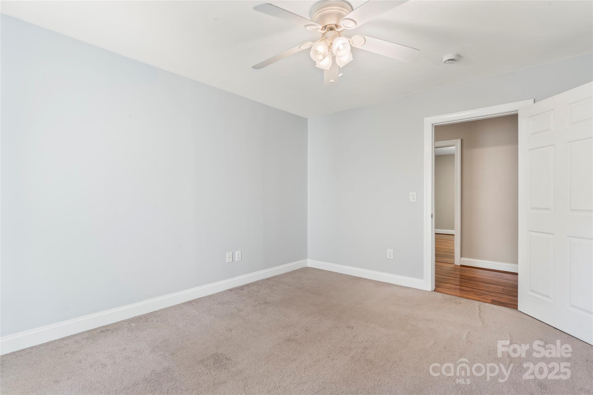 8450 Red Road Rockwell, NC 28138 - Photo 33 of 48 an empty room with a chandelier fan
