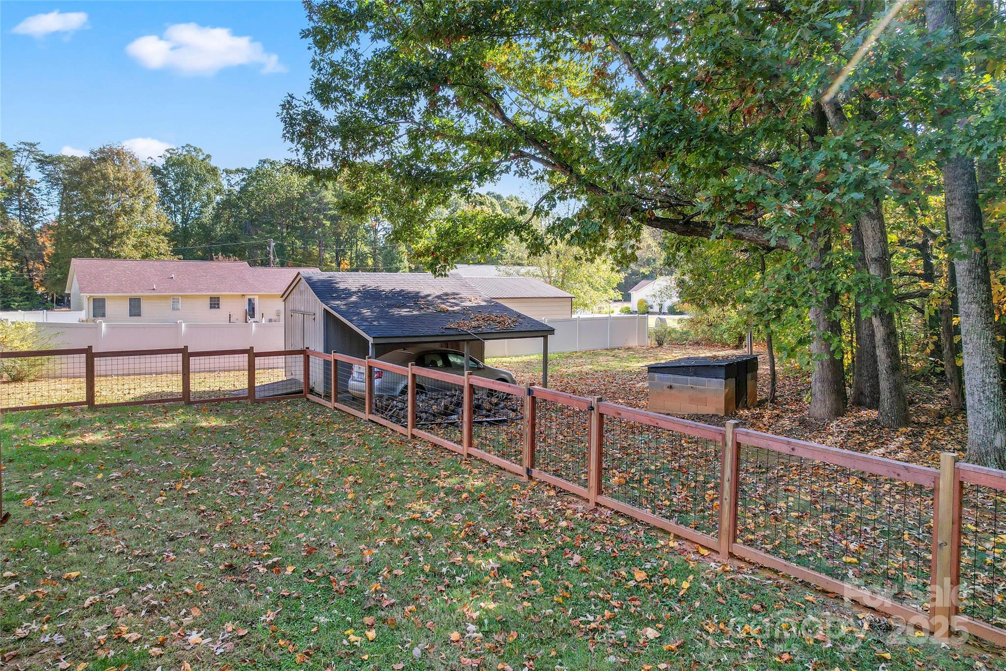 8450 Red Road Rockwell, NC 28138 - Photo 38 of 48 a view of a house with wooden fence