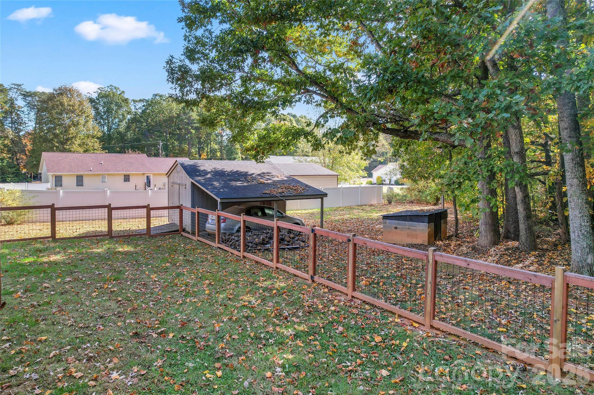 8450 Red Road Rockwell, NC 28138 - Photo 38 of 48 a view of a house with wooden fence