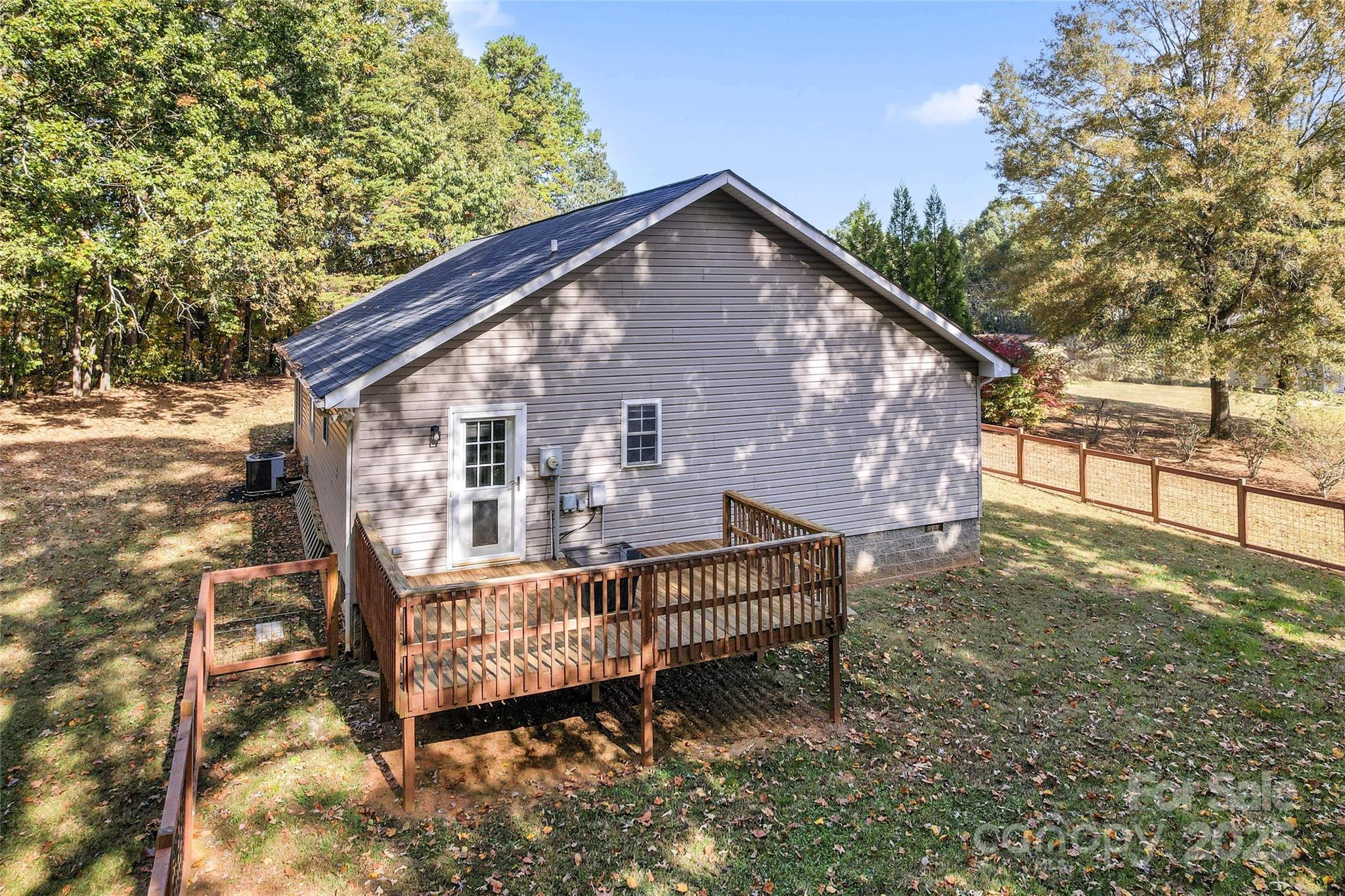 8450 Red Road Rockwell, NC 28138 - Photo 42 of 48 a view of a house with a yard and sitting area