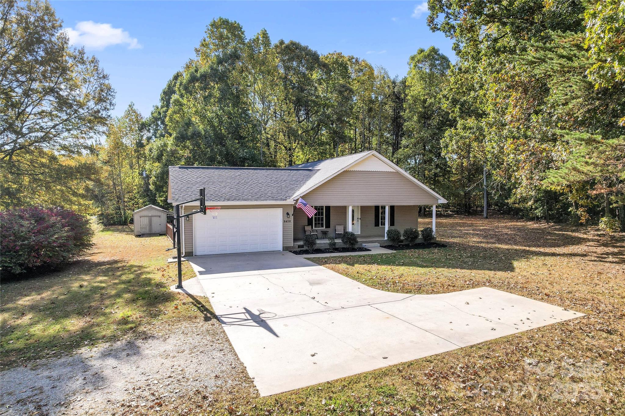 8450 Red Road Rockwell, NC 28138 - Photo 5 of 48 a view of a house with pool and sitting area